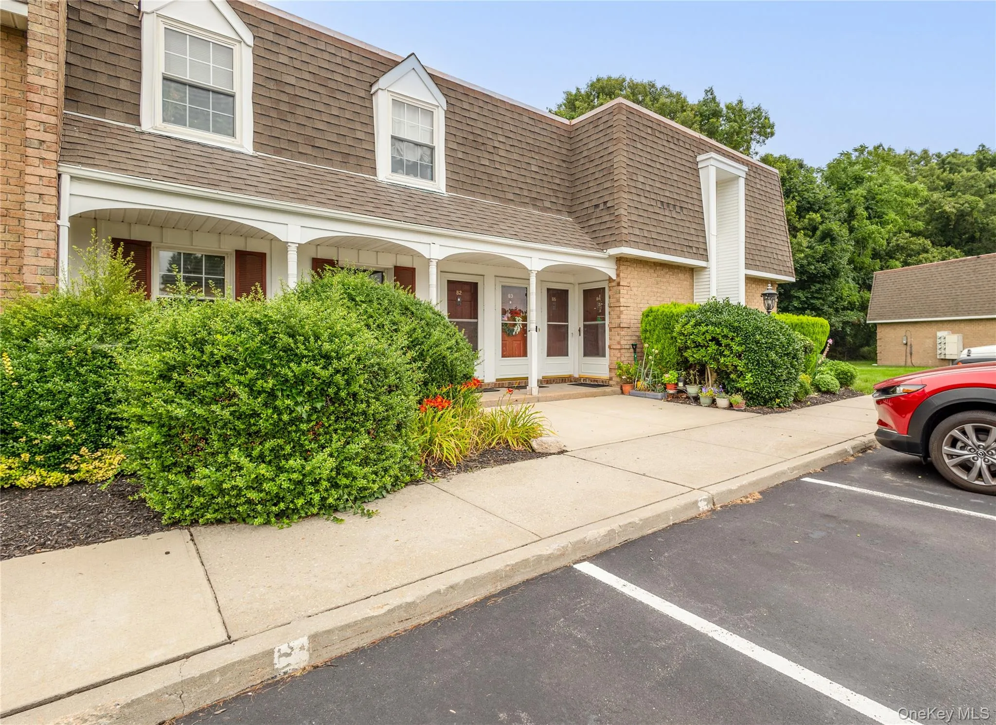 #65 Ground Level Entry - upper level end unit - 1 assigned parking and 1 unassigned parking per unit #65 Ground Level Entry - upper level end unit - 1 assigned parking and 1 unassigned parking per unit