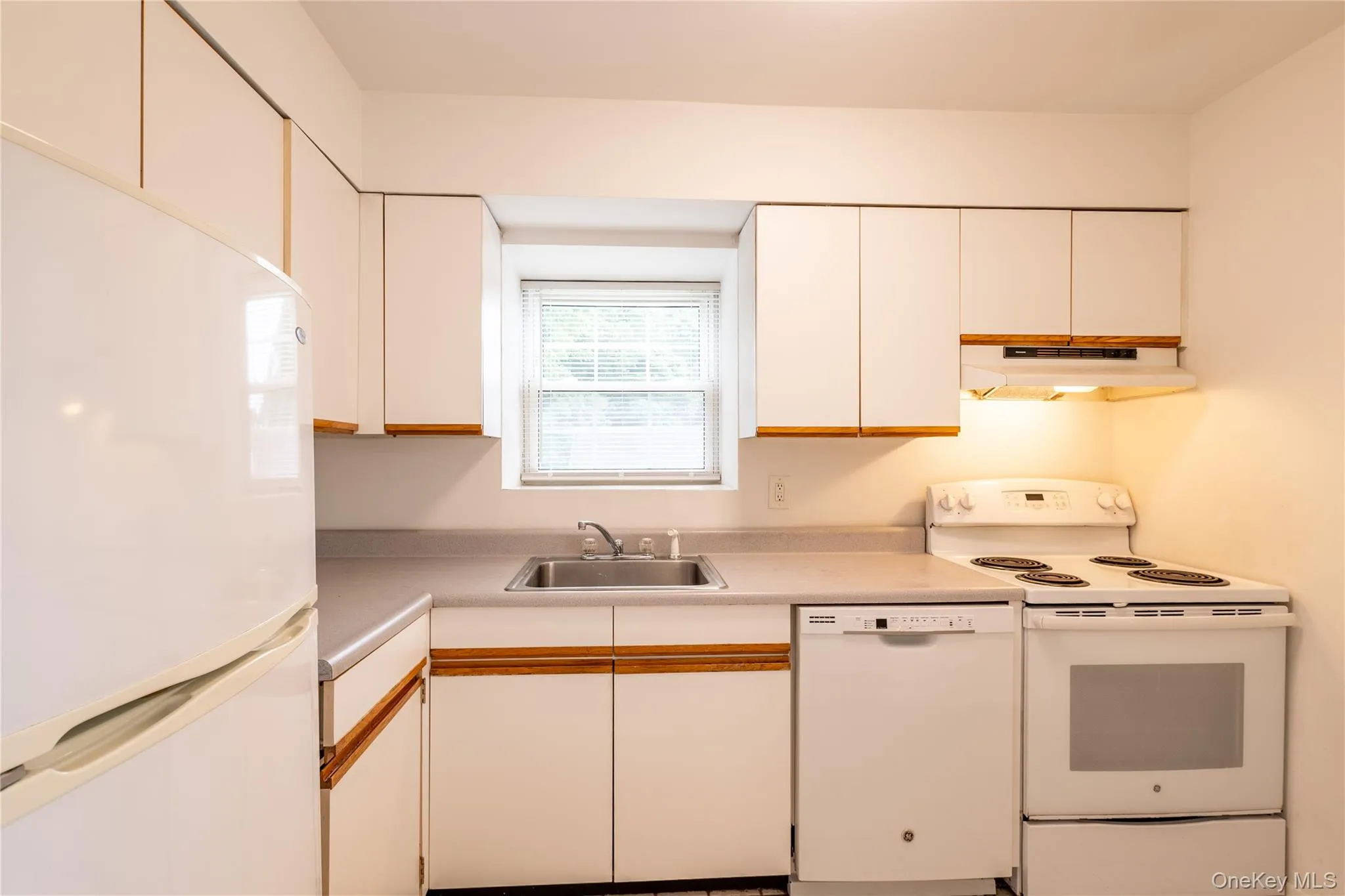 stainless sink, dishwasher, electric stove, refrigerator, window, ample cabinetry, tile floor stainless sink, dishwasher, electric stove, refrigerator, window, ample cabinetry, tile floor