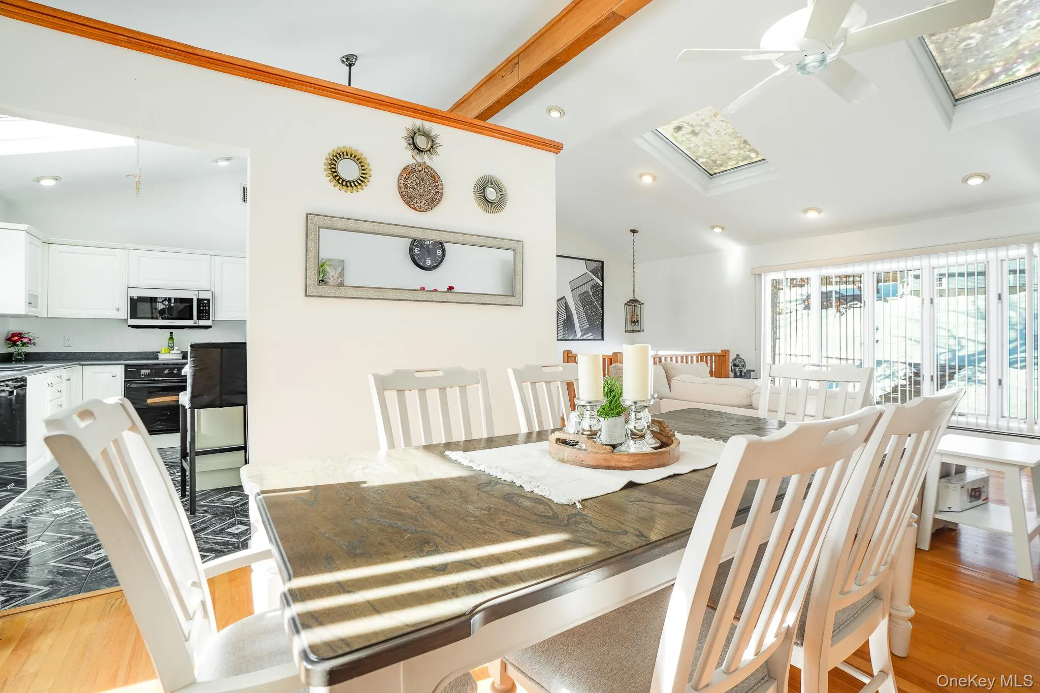 Another view of the formal dining room with an open concept to the living room. Another view of the formal dining room with an open concept to the living room.