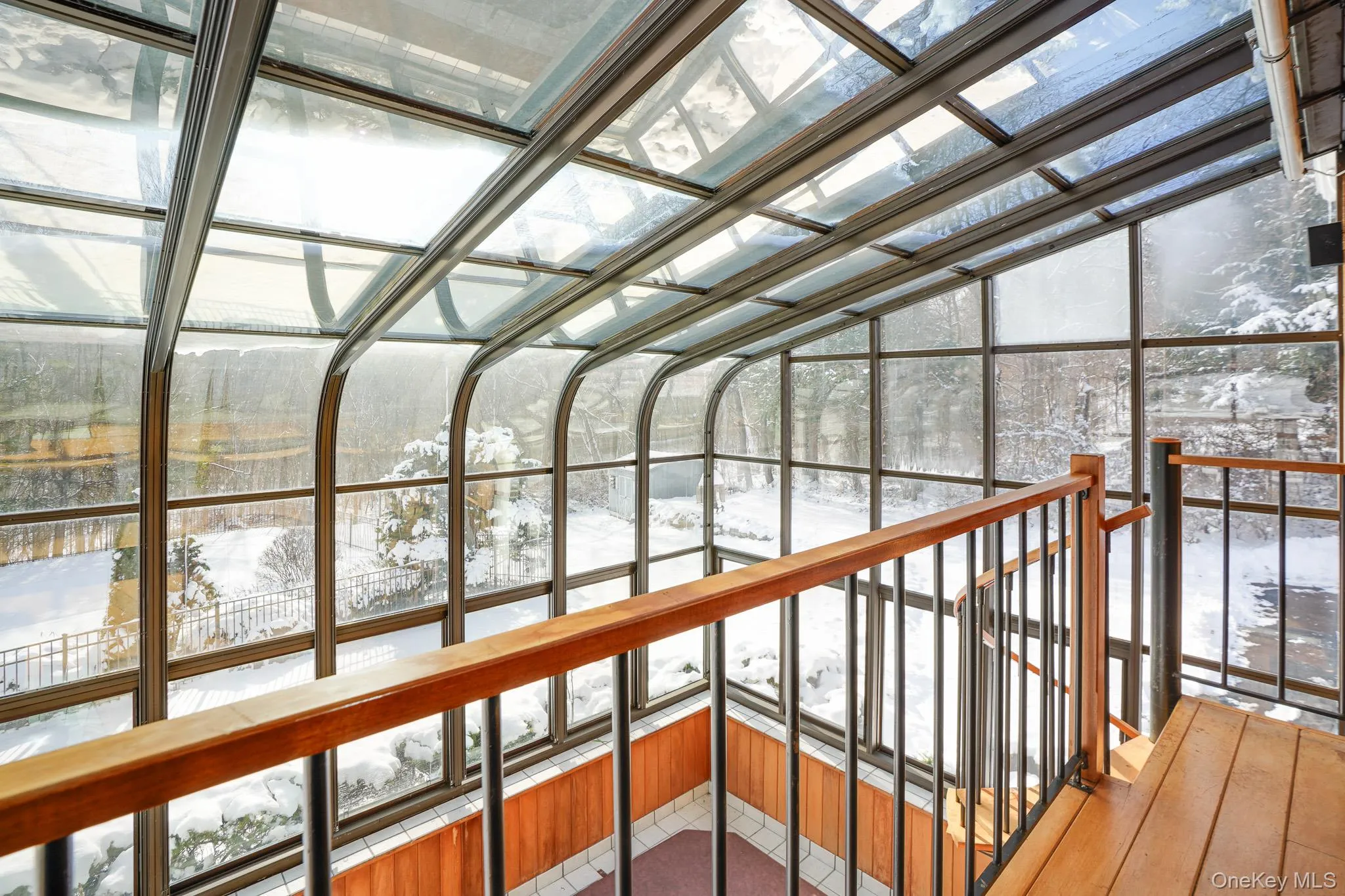 Glass-enclosed patio. Glass-enclosed patio.