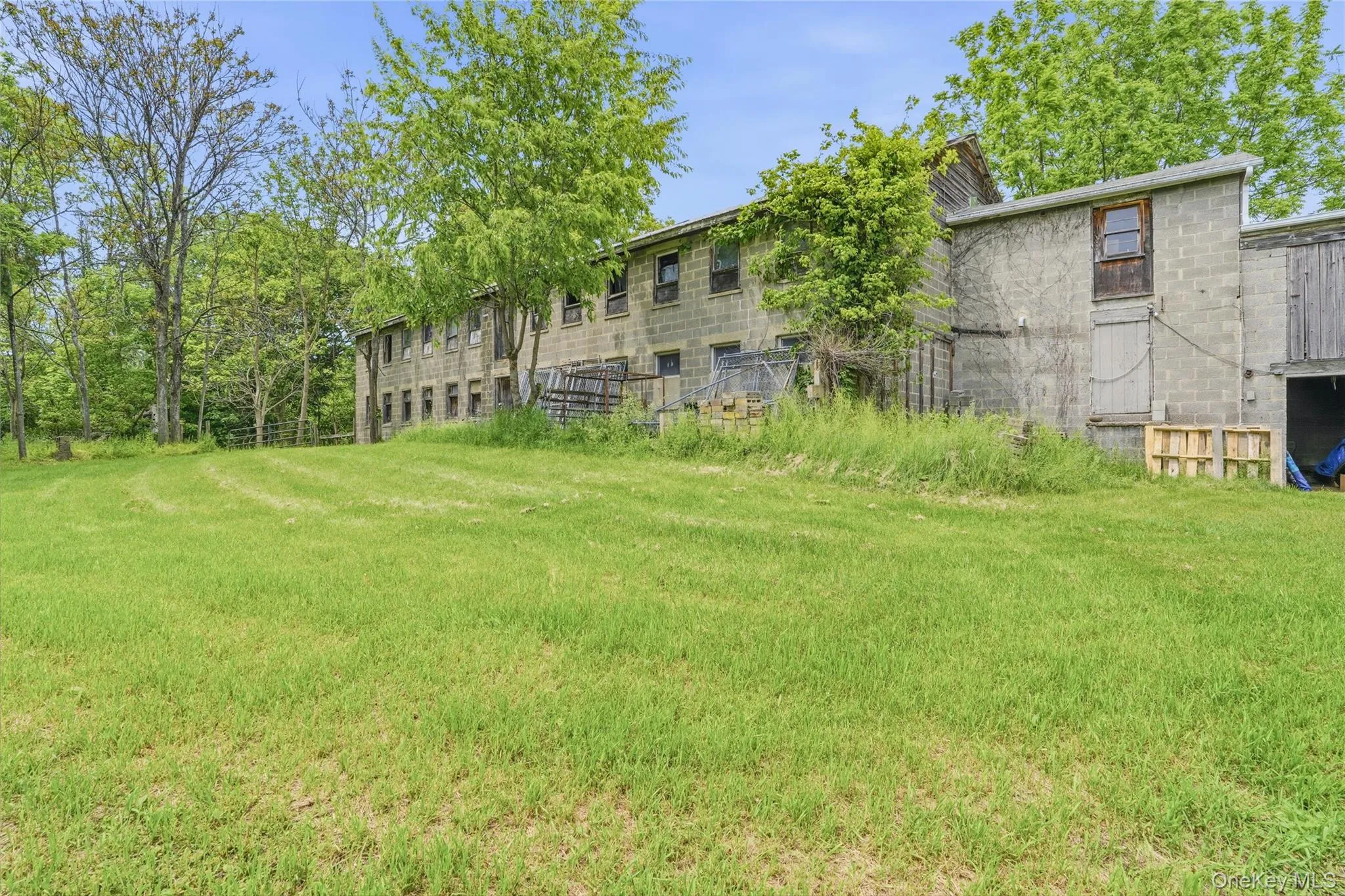 Large 2 Story Stable, Cement Floors and hay storage. Large 2 Story Stable, Cement Floors and hay storage.