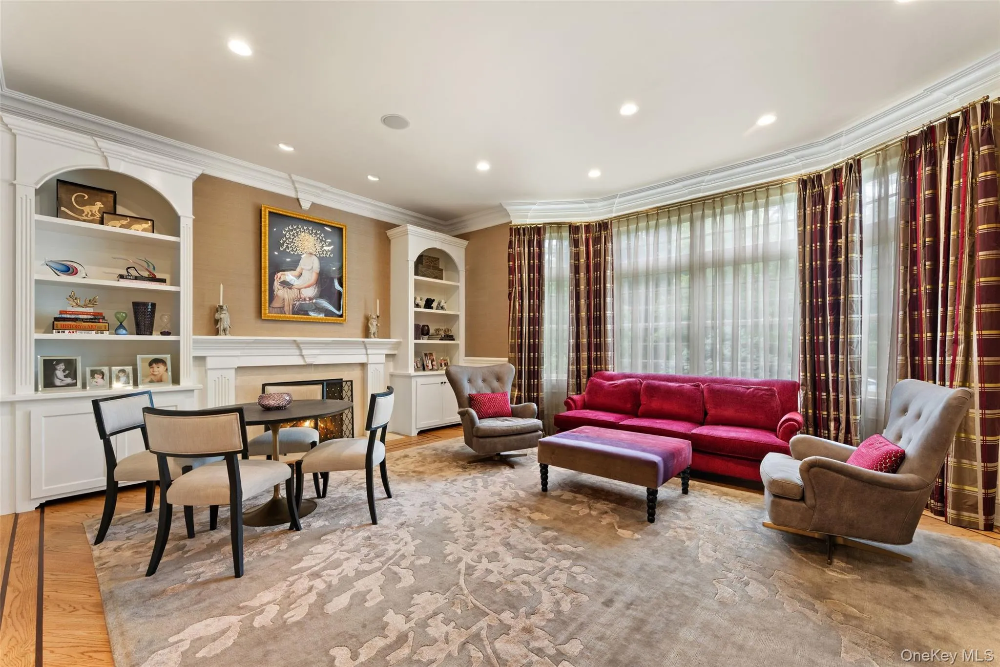 Living room with custom built in cabinetry Living room with custom built in cabinetry