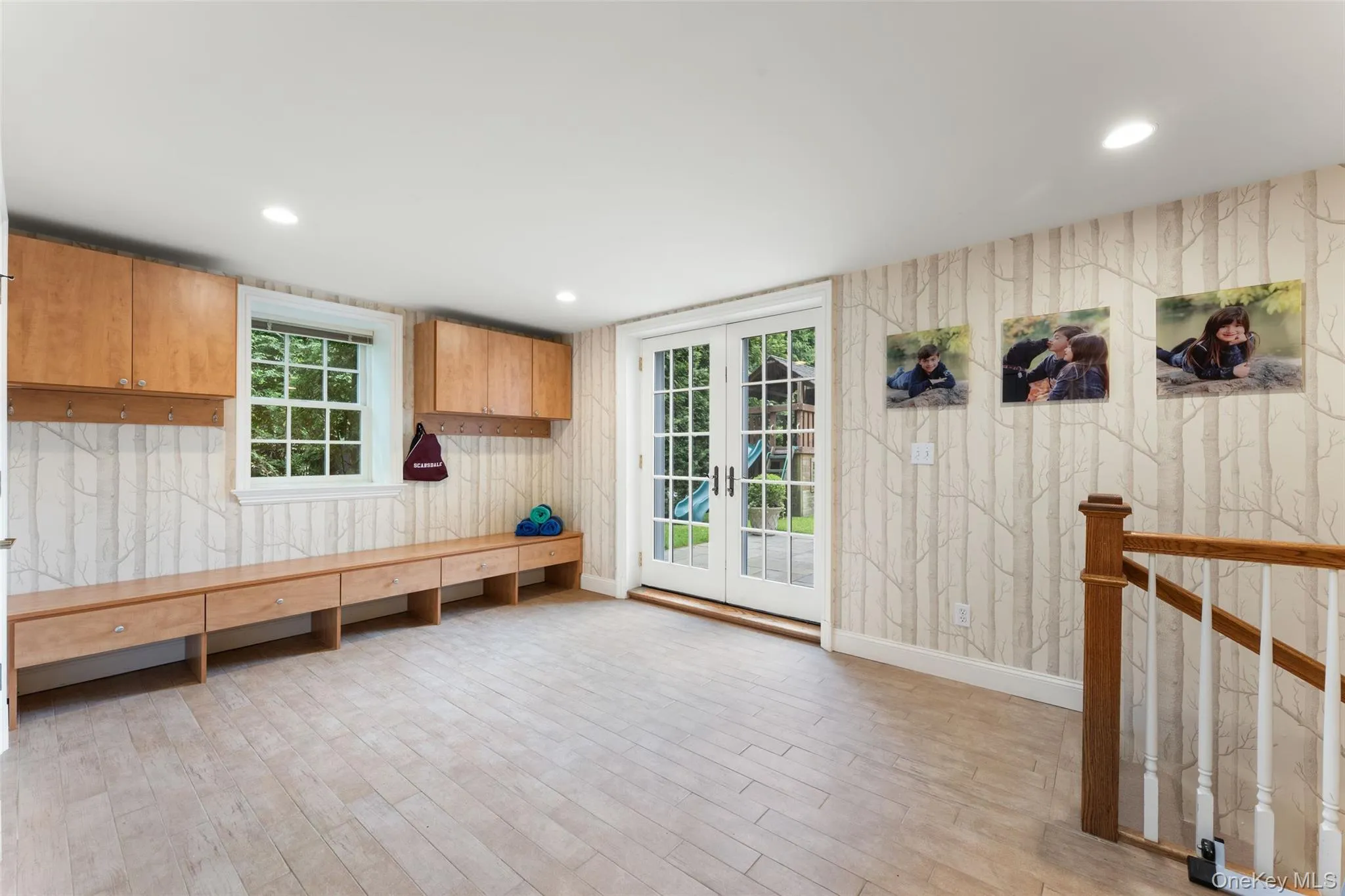 Mudroom with doors to backyard Mudroom with doors to backyard