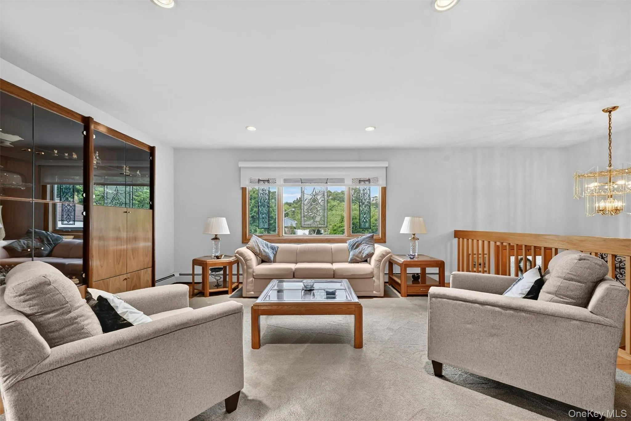 Inviting living room featuring a wide-open layout, generous seating area, and seamless flow for everyday living and entertaining. Inviting living room featuring a wide-open layout, generous seating area, and seamless flow for everyday living and entertaining.