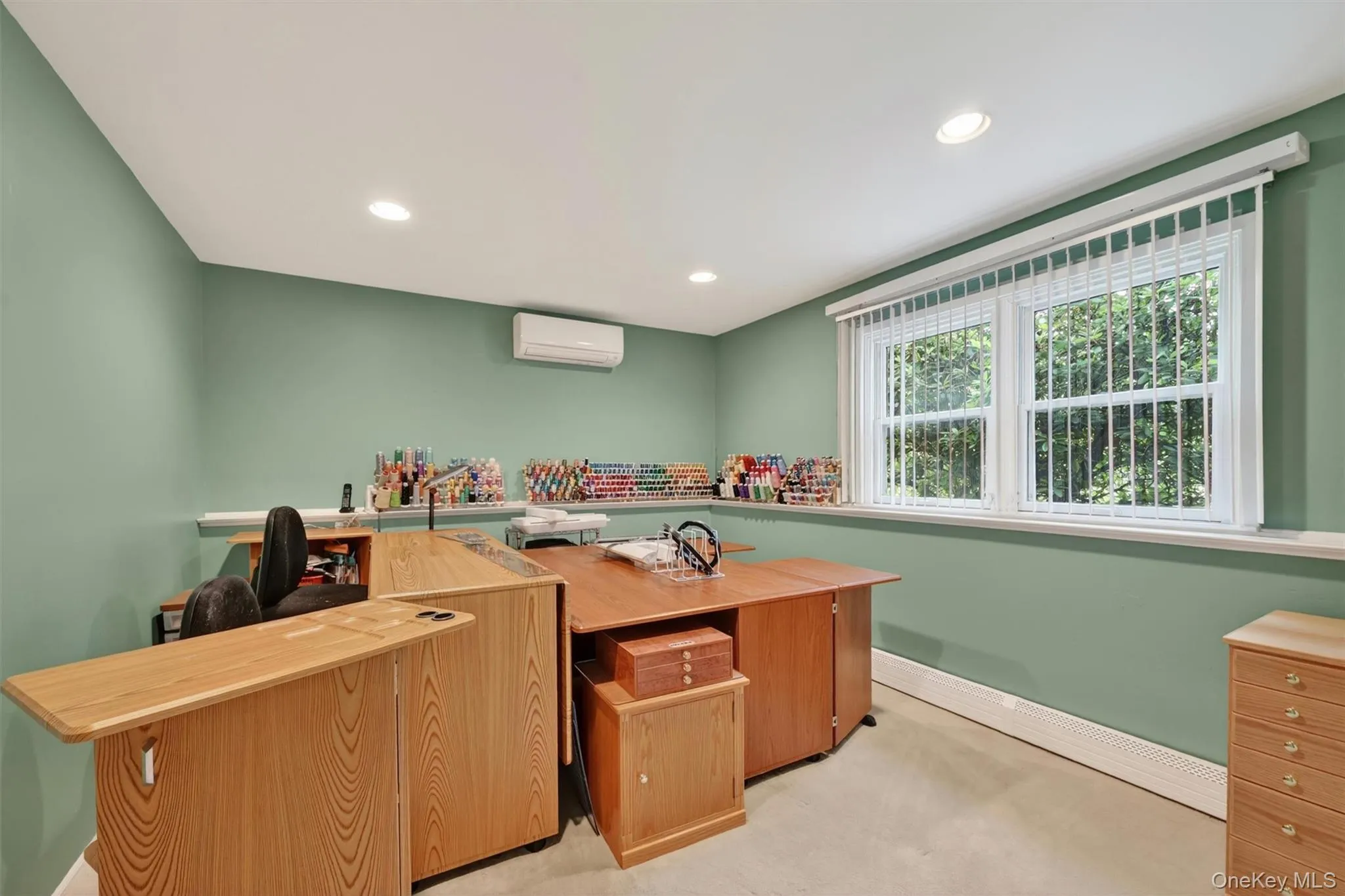 FOURTH BEDROOM: Spacious lower-level room offering endless possibilities as a fourth bedroom, home office, hobby room, fitness area, etc. FOURTH BEDROOM: Spacious lower-level room offering endless possibilities as a fourth bedroom, home office, hobby room, fitness area, etc.