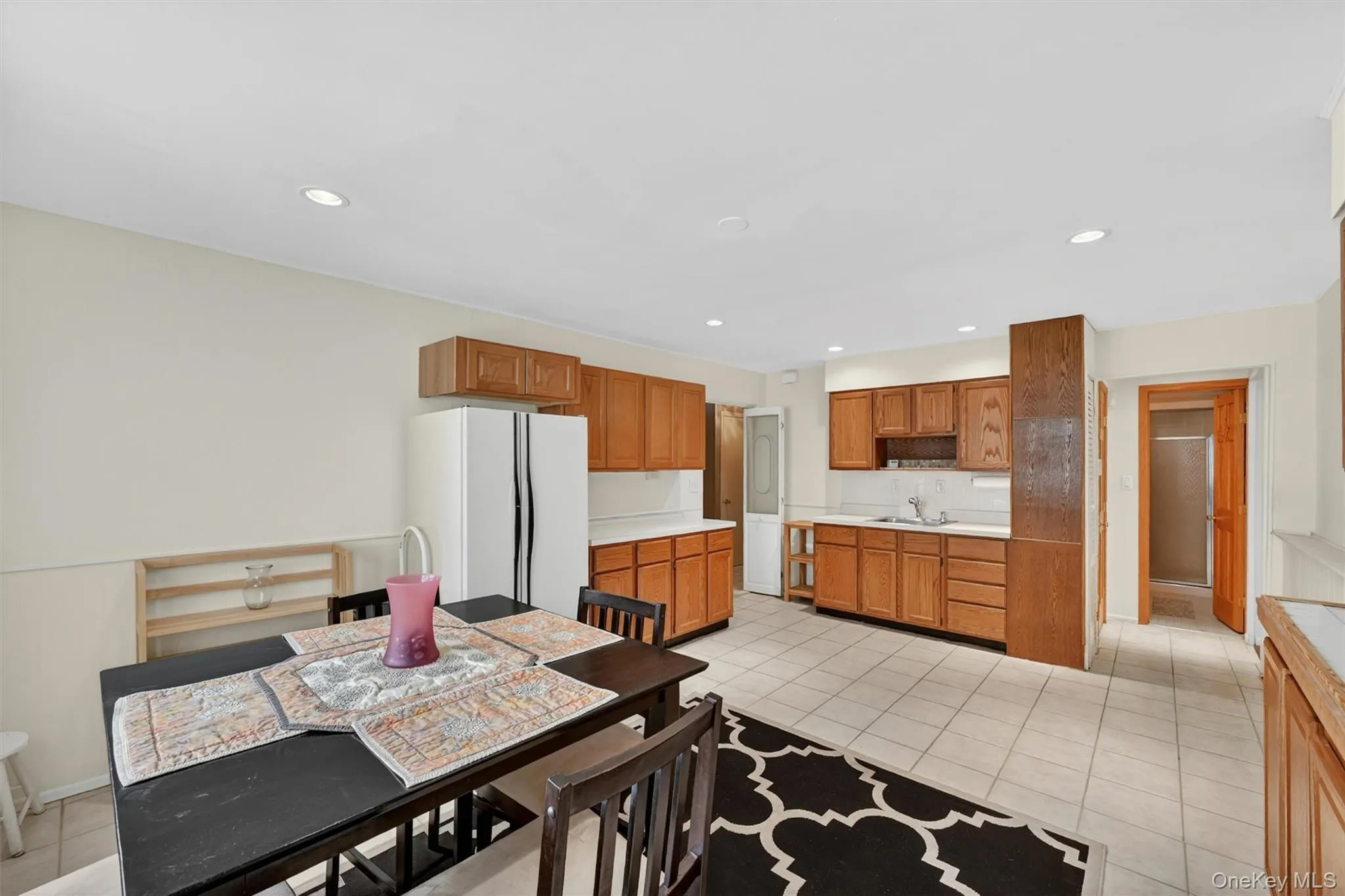 Bright and functional lower-level kitchen offering a flexible layout, generous storage, and everyday convenience. Bright and functional lower-level kitchen offering a flexible layout, generous storage, and everyday convenience.