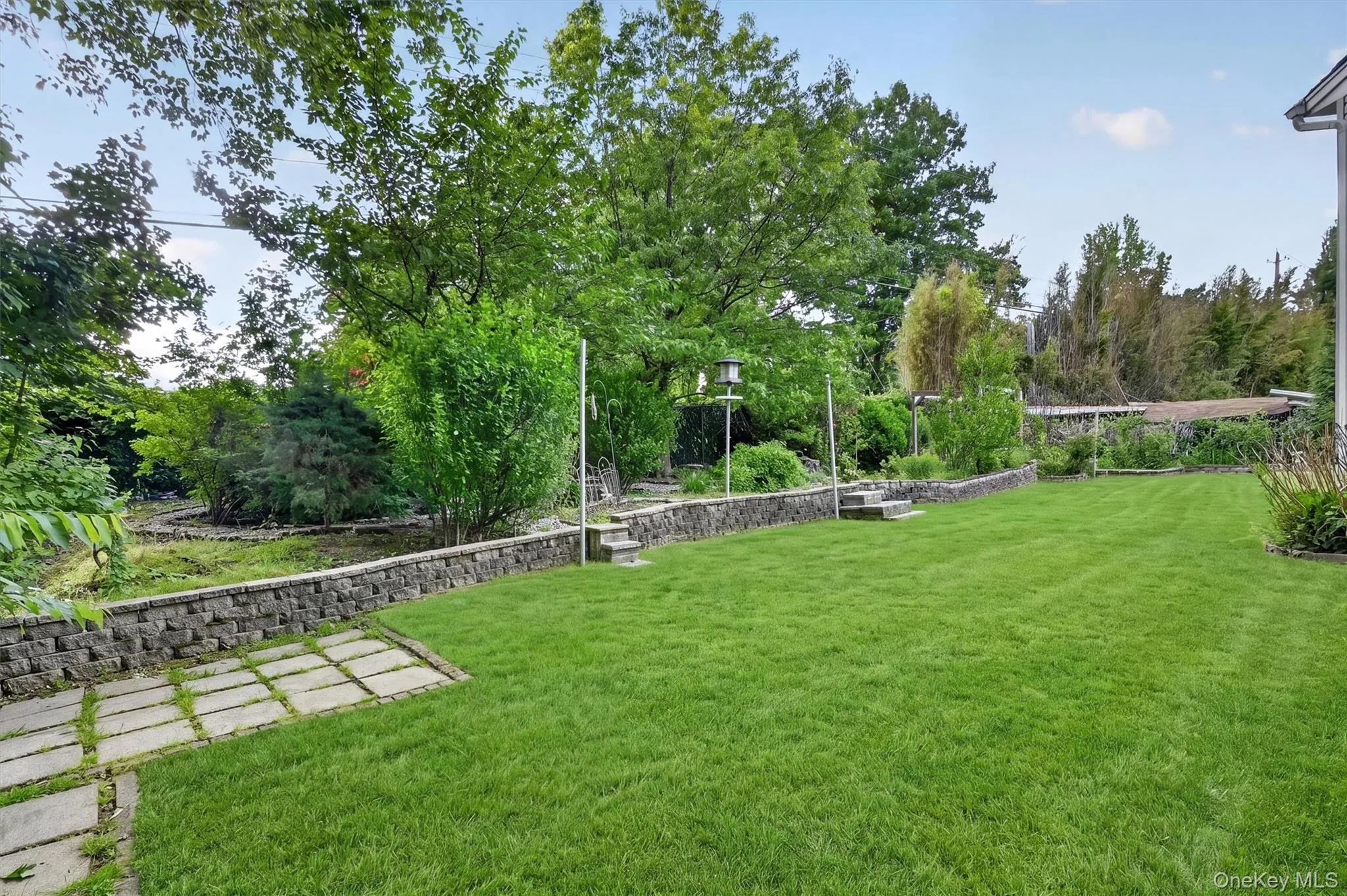 Expansive, level backyard offering exceptional outdoor space, mature landscaping, and endless possibilities for recreation and entertaining. Expansive, level backyard offering exceptional outdoor space, mature landscaping, and endless possibilities for recreation and entertaining.