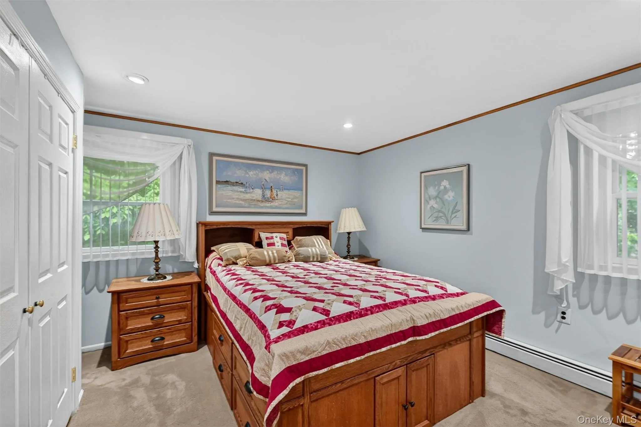 Spacious primary bedroom featuring soft natural light, generous closet space, and a peaceful retreat-like setting. Spacious primary bedroom featuring soft natural light, generous closet space, and a peaceful retreat-like setting.