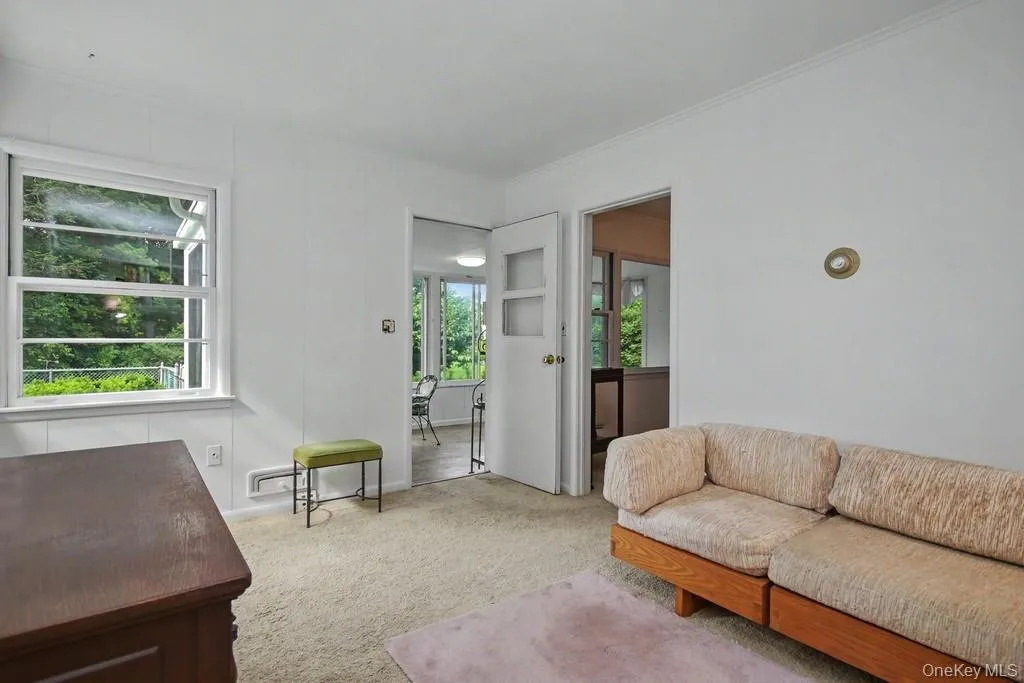 Den has a door to enclosed porch Den has a door to enclosed porch
