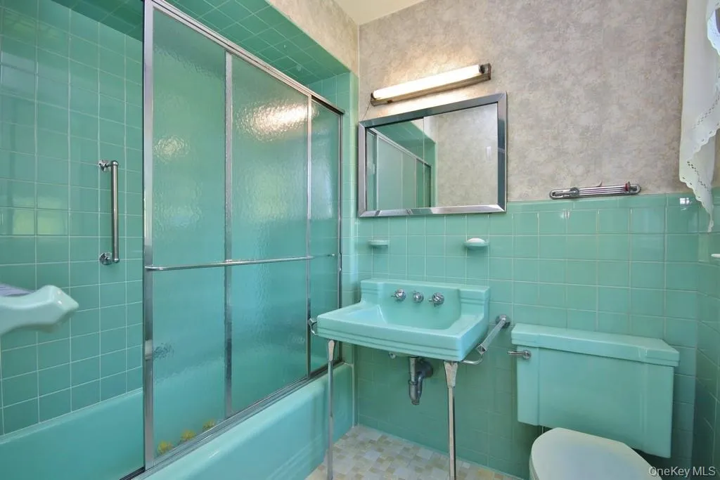 Primary Bathroom has bathtub with shower Primary Bathroom has bathtub with shower