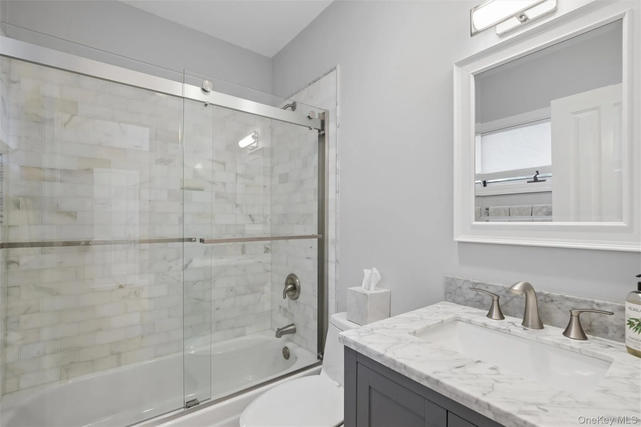 Full Bath with custom tiled tub on the main floor Full Bath with custom tiled tub on the main floor