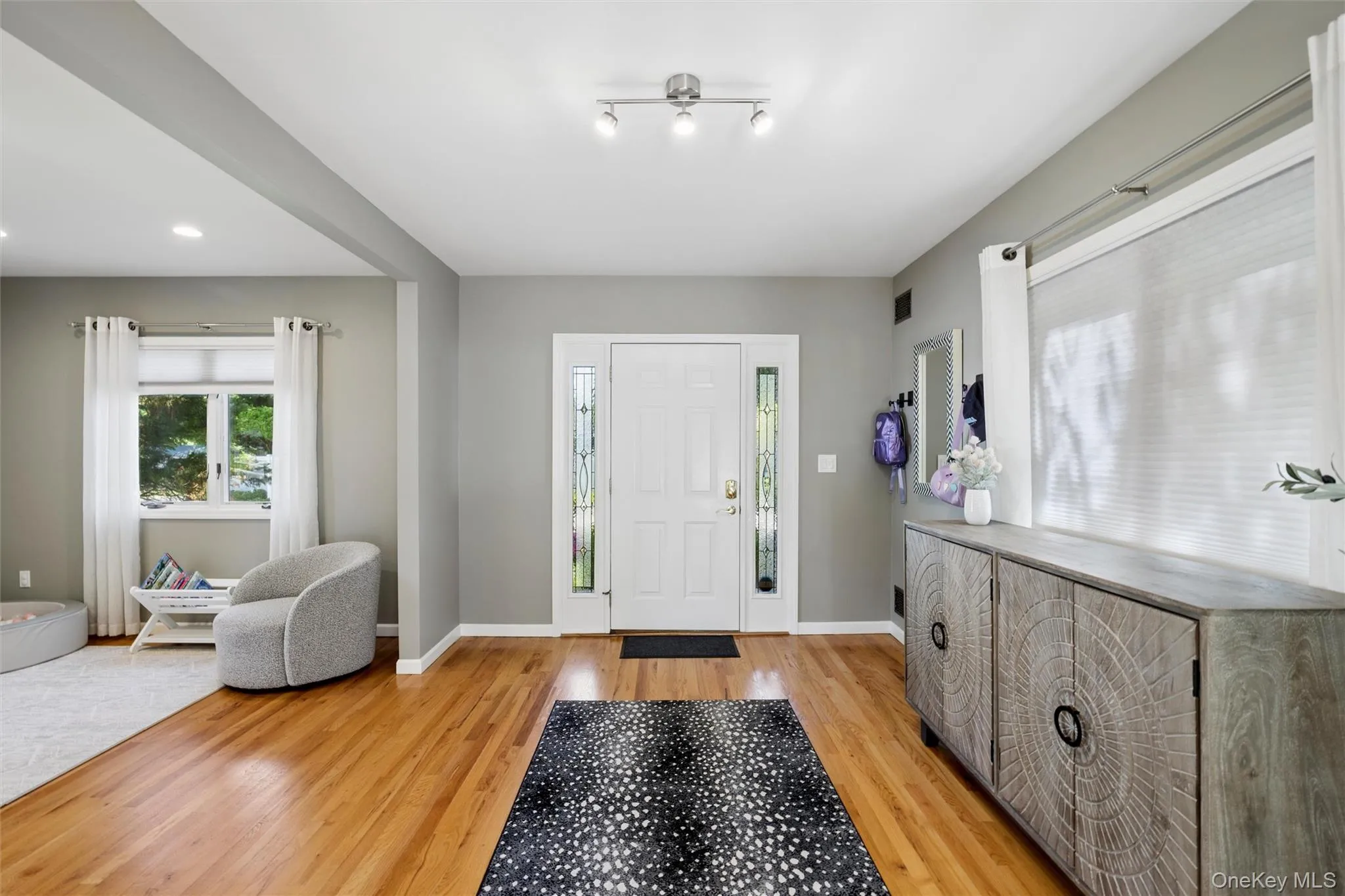 Entry foyer, Hardwood floors Entry foyer, Hardwood floors