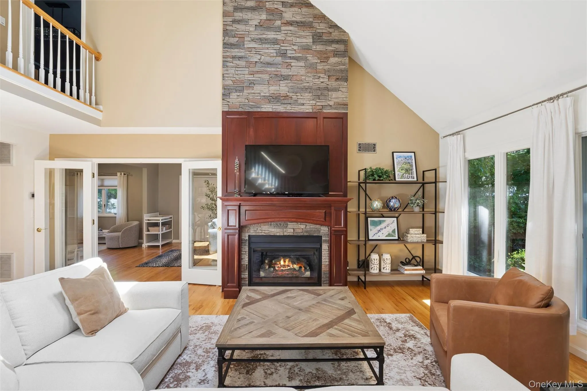 Cathedral Ceilings accent this gorgeous cherry wood (gas) fireplace mantle Cathedral Ceilings accent this gorgeous cherry wood (gas) fireplace mantle