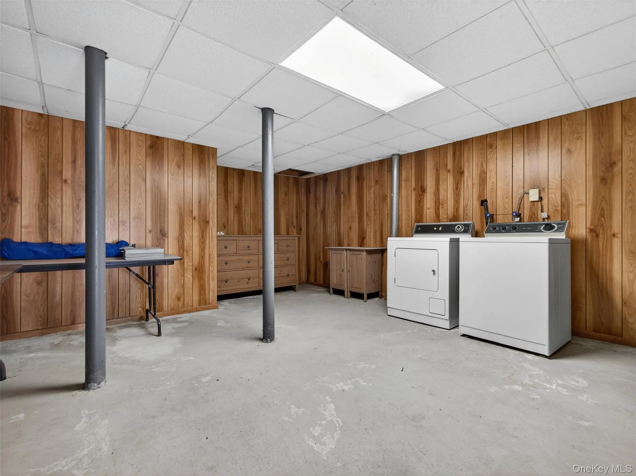 Expansive private basement providing laundry facilities and endless possibilities for storage, hobbies, or recreation. Expansive private basement providing laundry facilities and endless possibilities for storage, hobbies, or recreation.