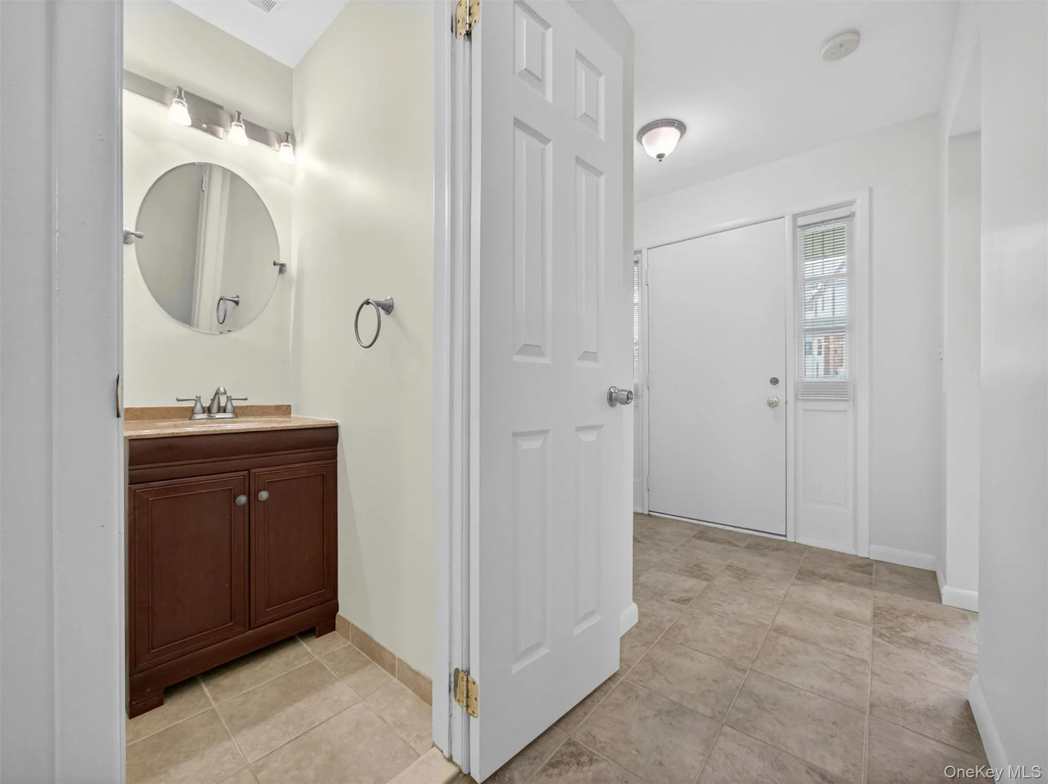 Convenient main-level powder room for guests and everyday living. Convenient main-level powder room for guests and everyday living.