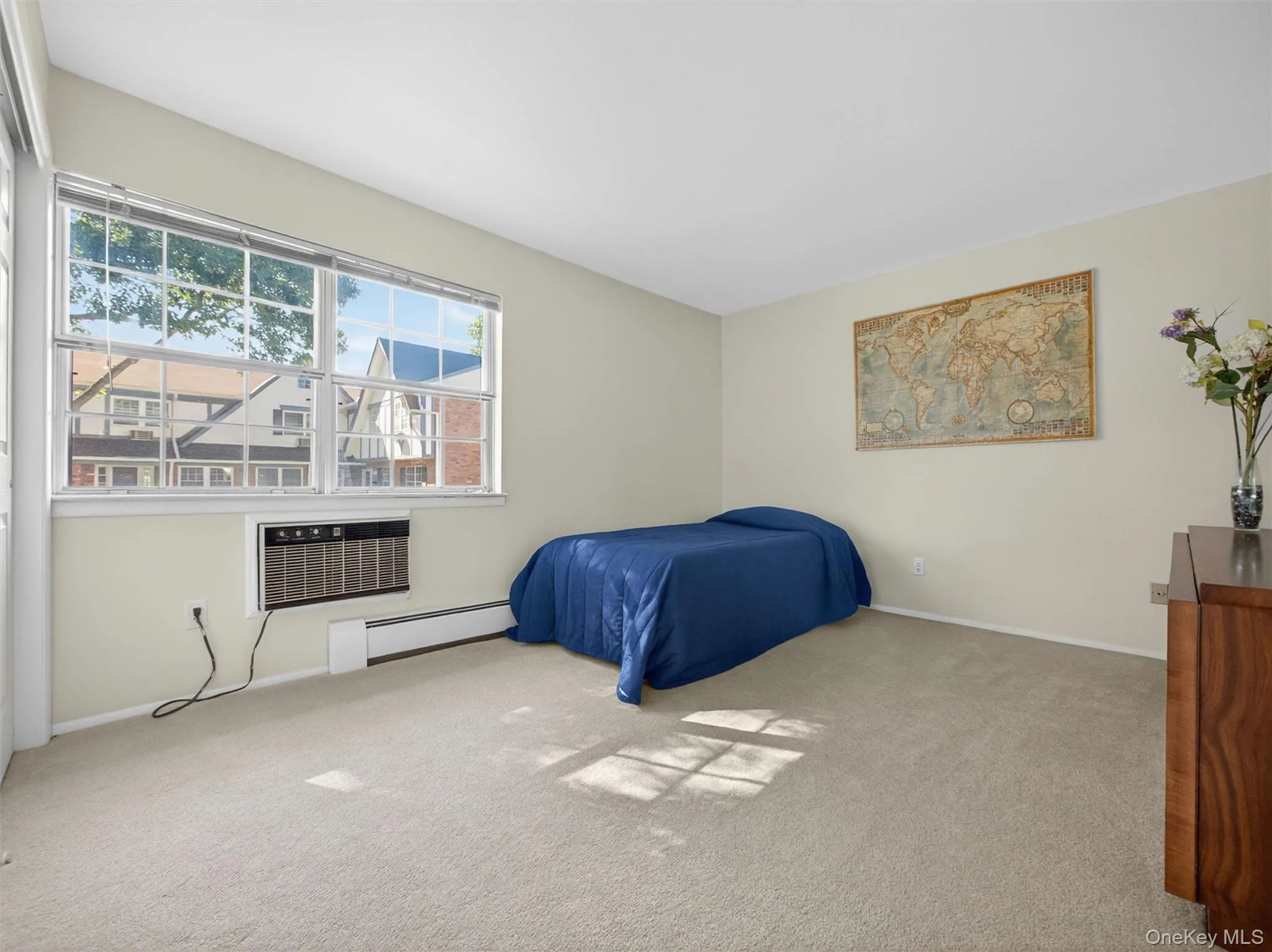 Bright second bedroom with generous closet space and natural light. Bright second bedroom with generous closet space and natural light.