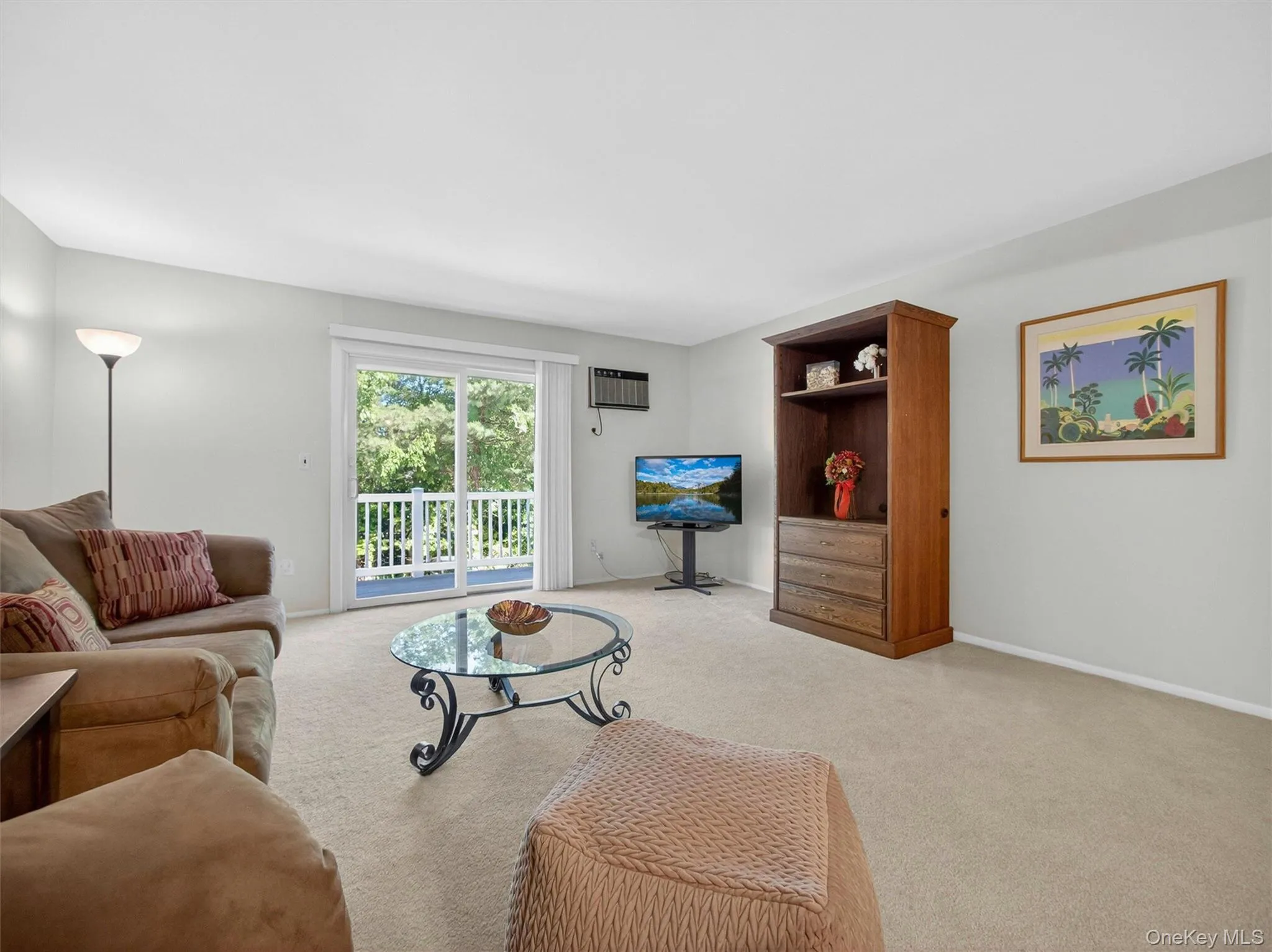 Bright living area offering plenty of space to relax and unwind. Bright living area offering plenty of space to relax and unwind.