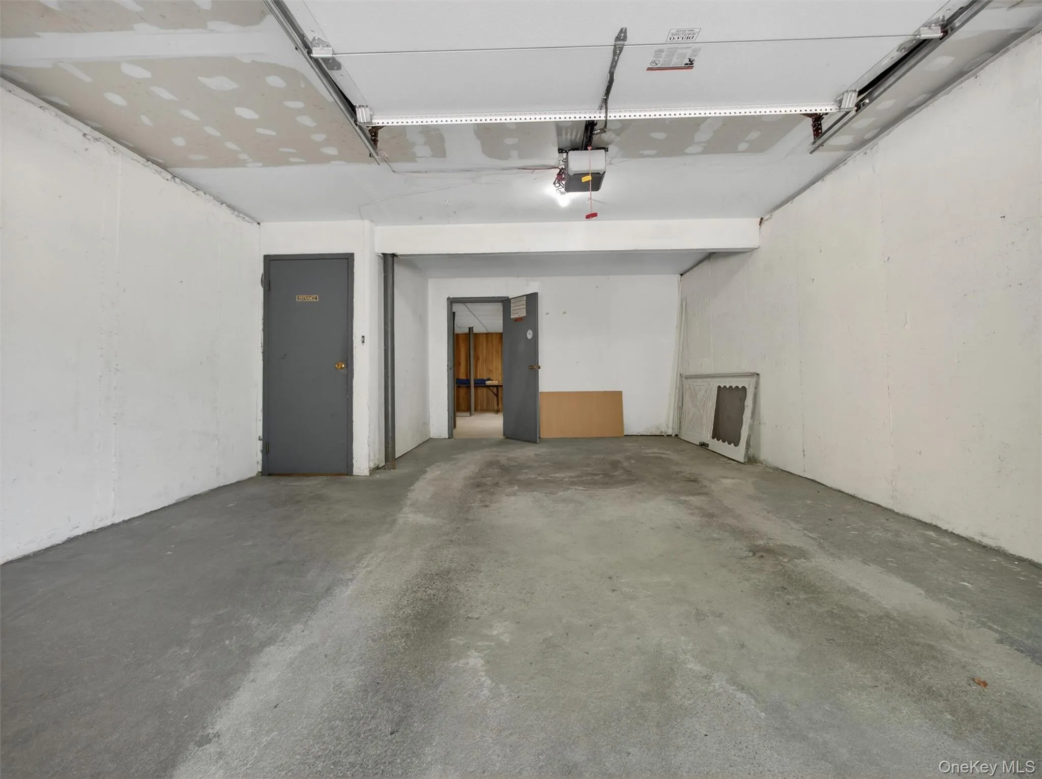 Private attached garage offering secure parking and additional storage space. Private attached garage offering secure parking and additional storage space.