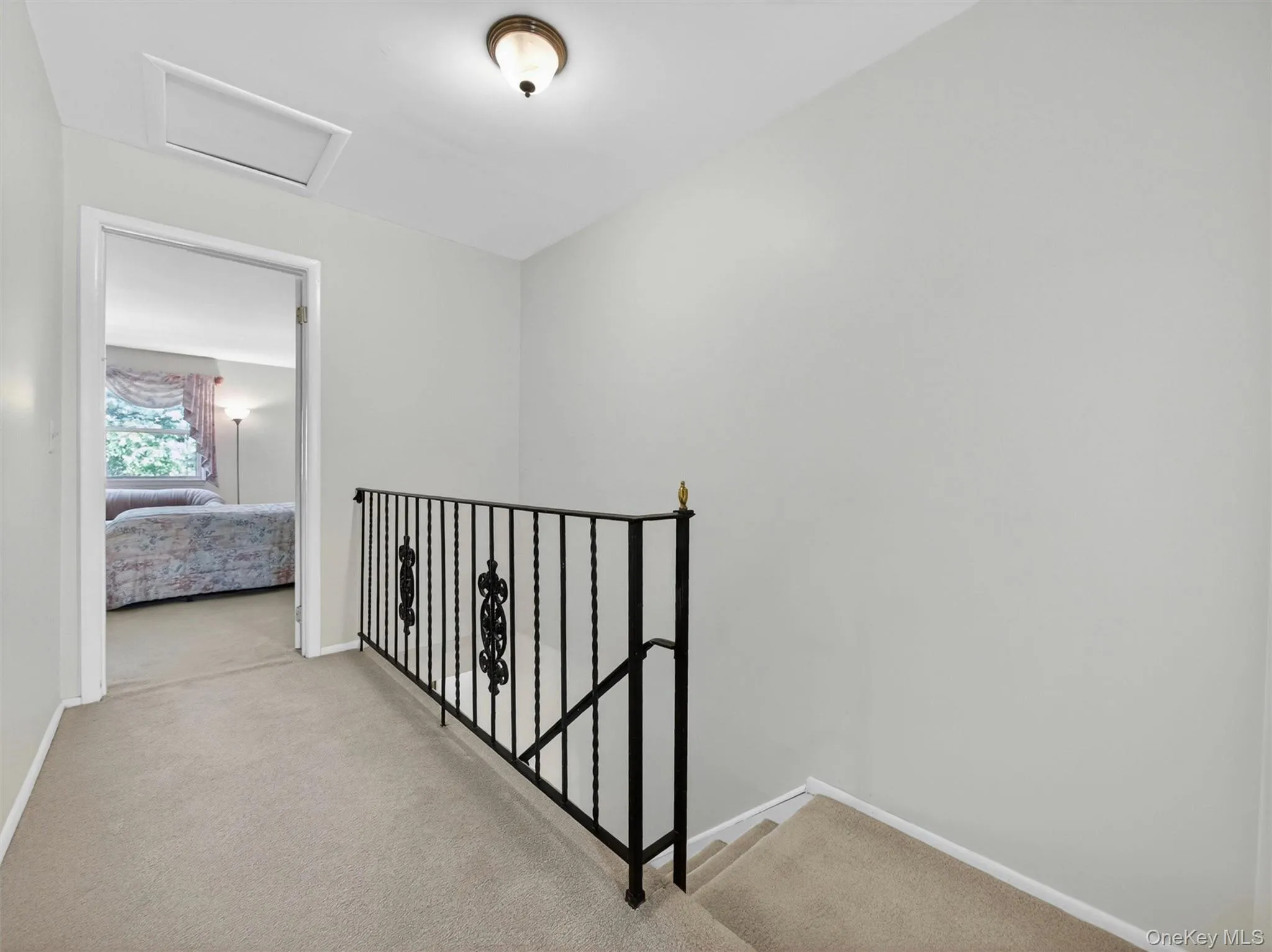 Upper-level landing providing access to the bedrooms and full baths. Upper-level landing providing access to the bedrooms and full baths.