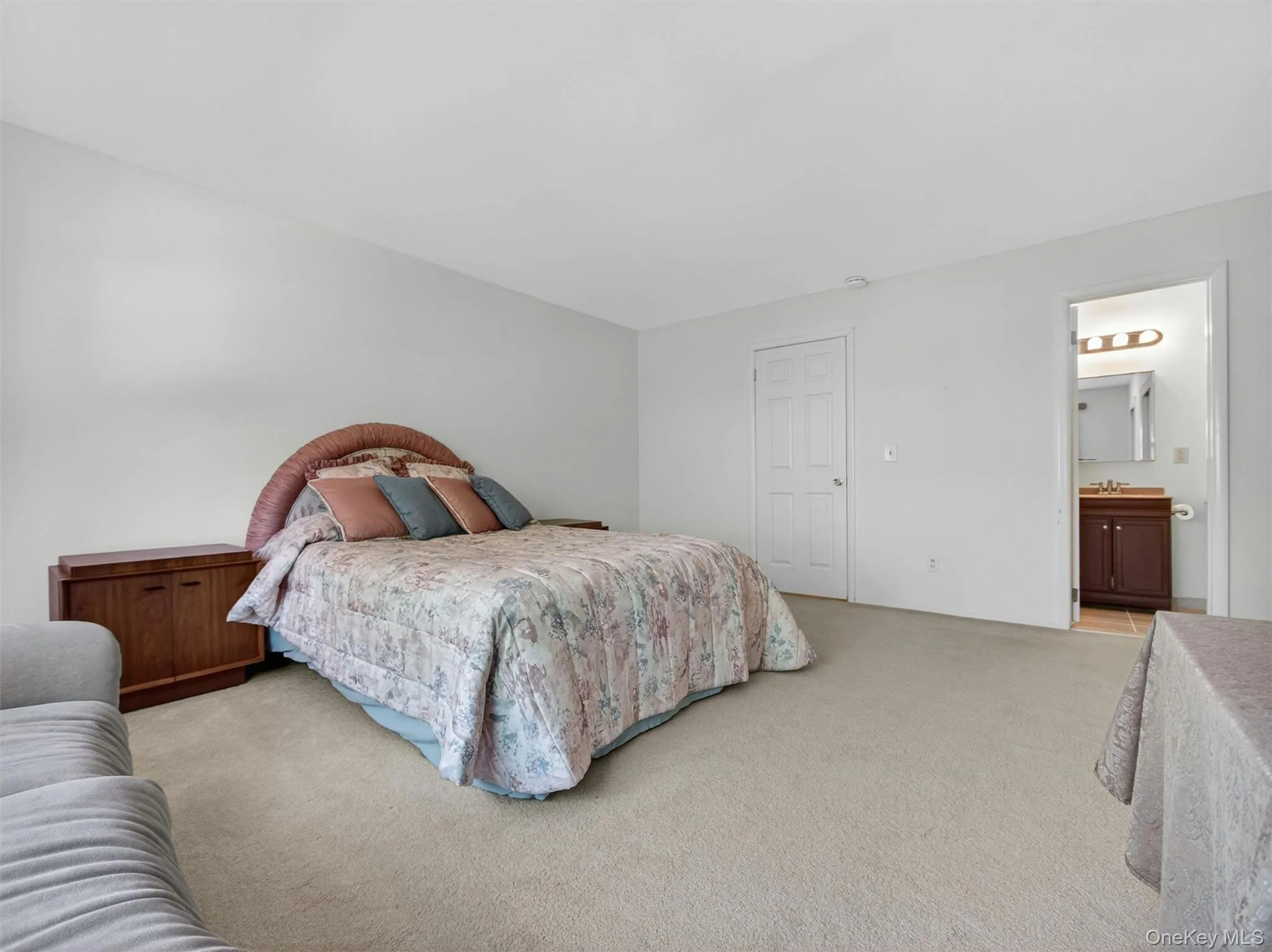Primary suite offering generous space, ample storage, and a private ensuite bathroom. Primary suite offering generous space, ample storage, and a private ensuite bathroom.