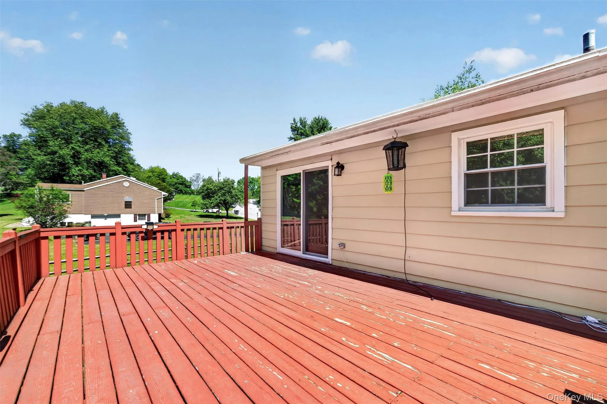 Oversized deck with stairs to yard. Great for entertaining Oversized deck with stairs to yard. Great for entertaining