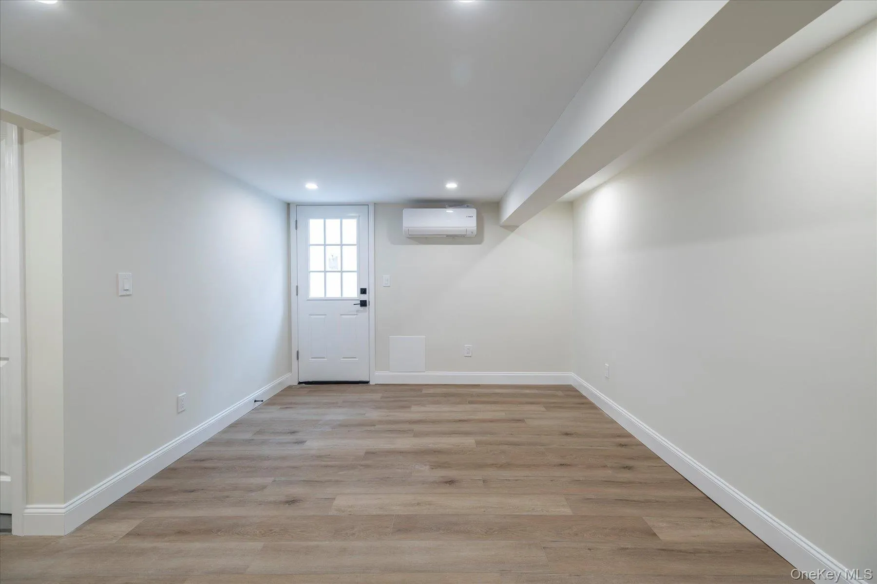 lower level finished with high ceilings, an outside entrance and a split unit for heat and a/c lower level finished with high ceilings, an outside entrance and a split unit for heat and a/c