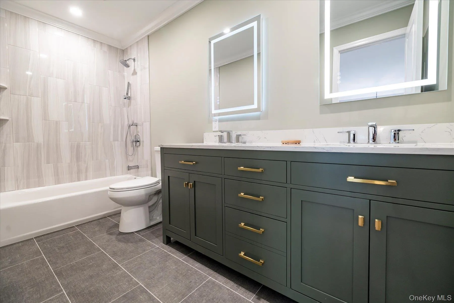 Hall full bath with a double sink and tub/shower combo Hall full bath with a double sink and tub/shower combo