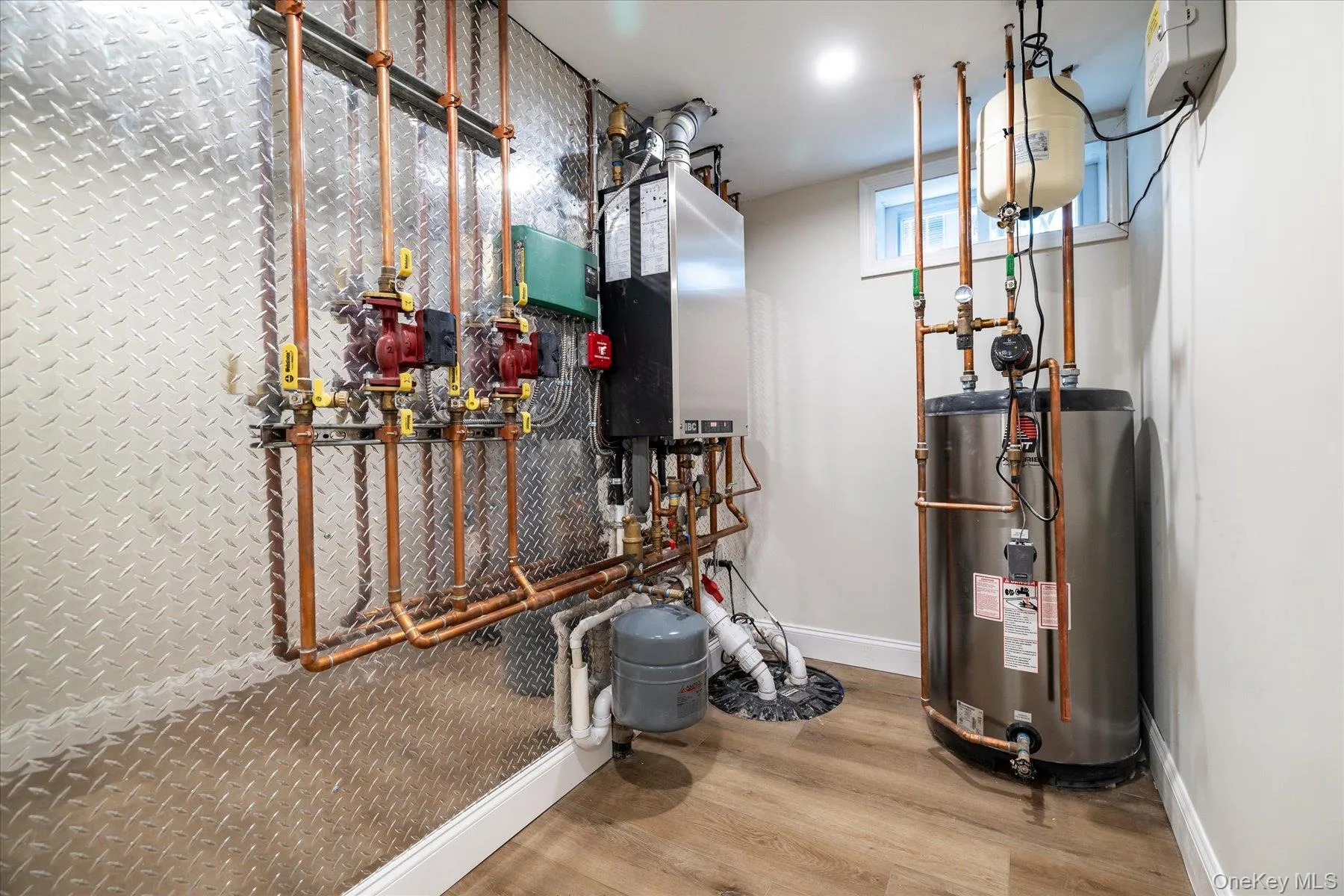 3 zones for heat and a/c, on-demand wall-mounted water heater and gas for heat and cooking 3 zones for heat and a/c, on-demand wall-mounted water heater and gas for heat and cooking