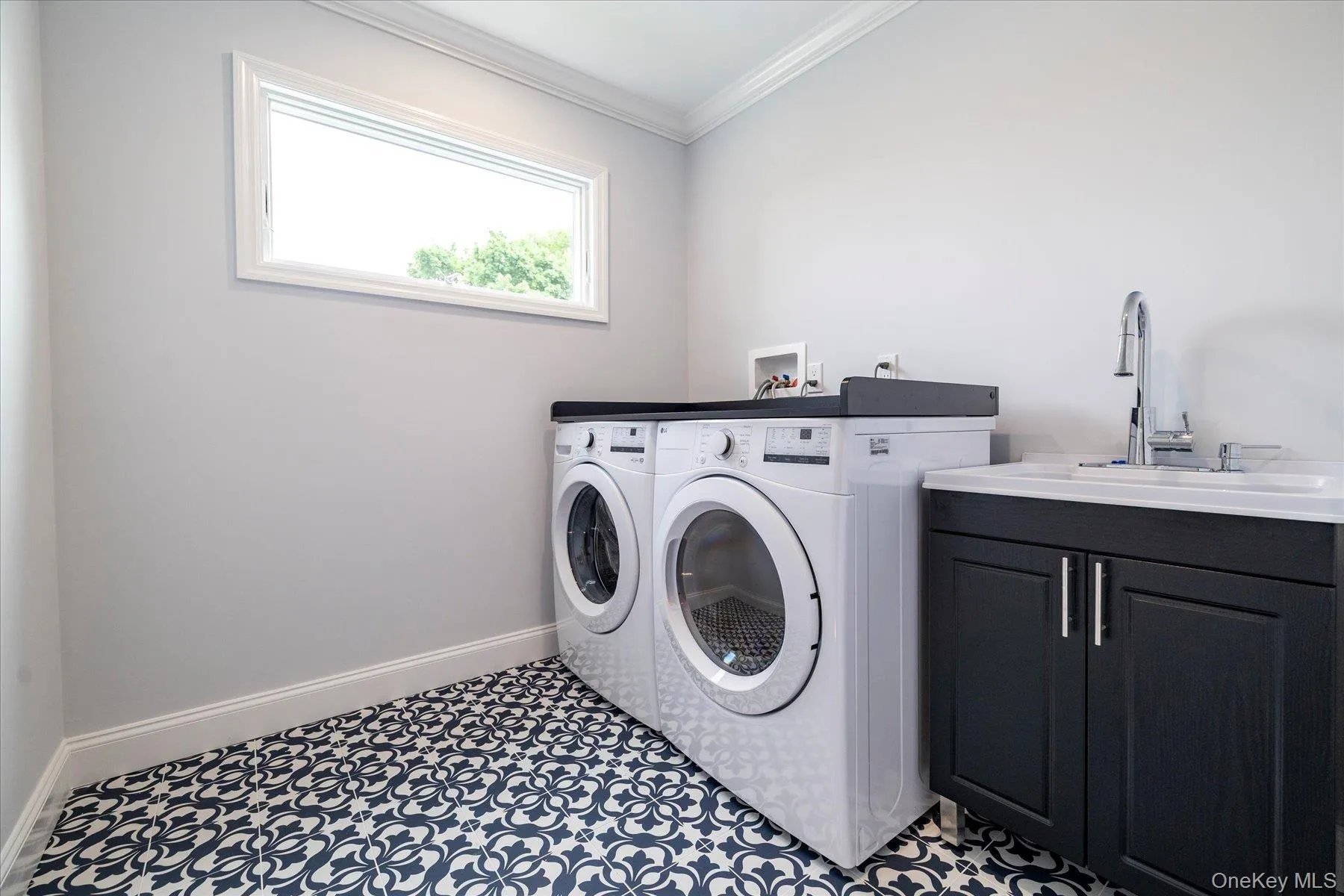 2nd floor laundry room with a sink 2nd floor laundry room with a sink