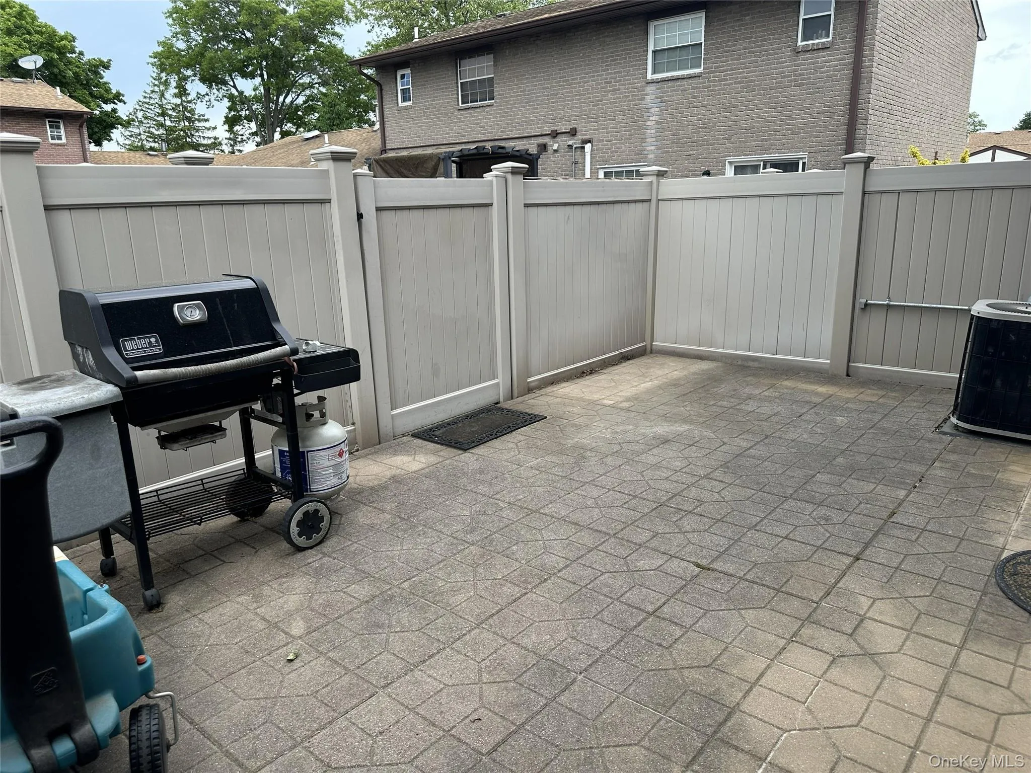 Spacious Private Patio with 5'PVC Fence Spacious Private Patio with 5'PVC Fence