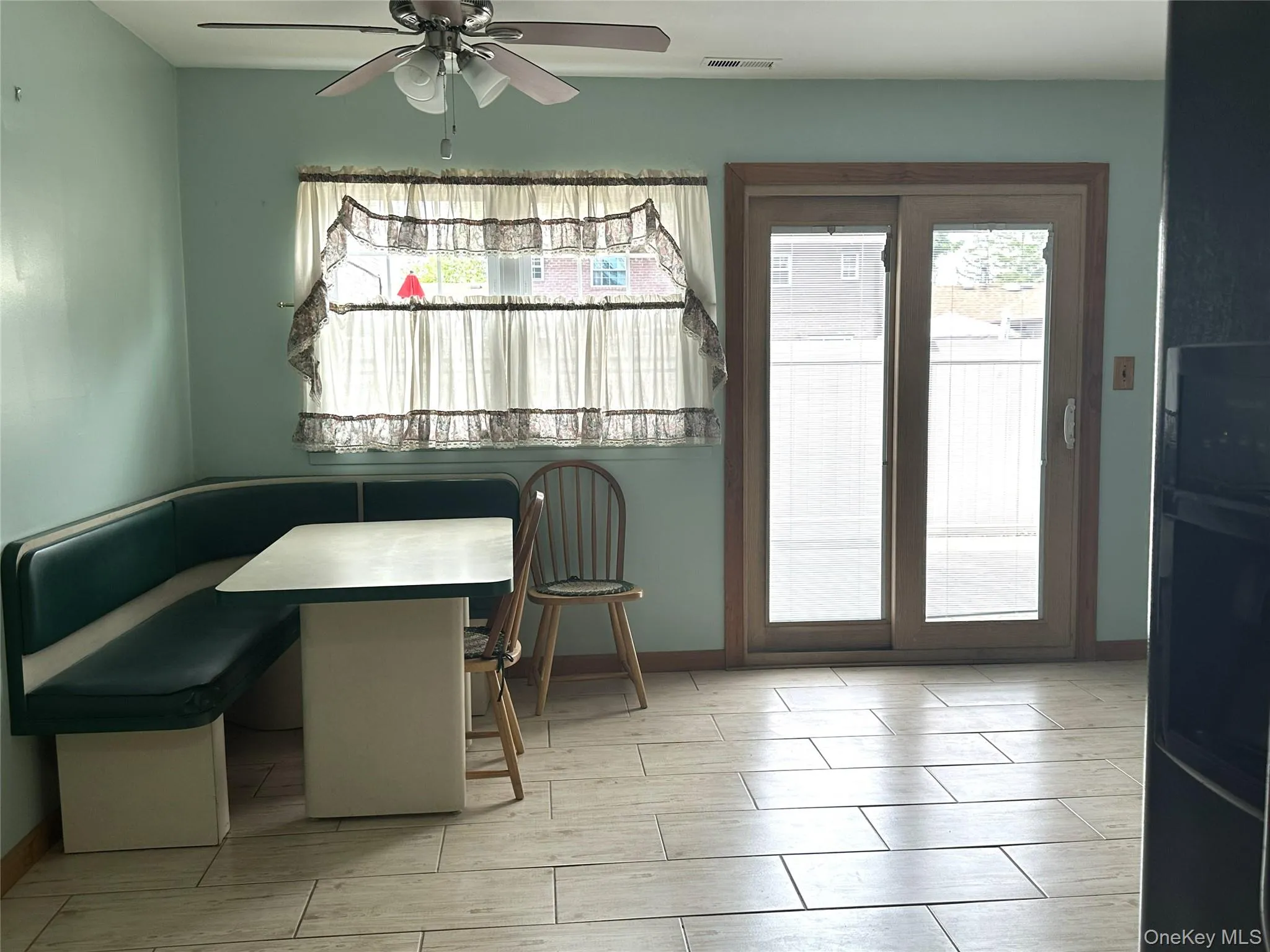 Dining Room with Sliding Glass Door to Private Patio Dining Room with Sliding Glass Door to Private Patio