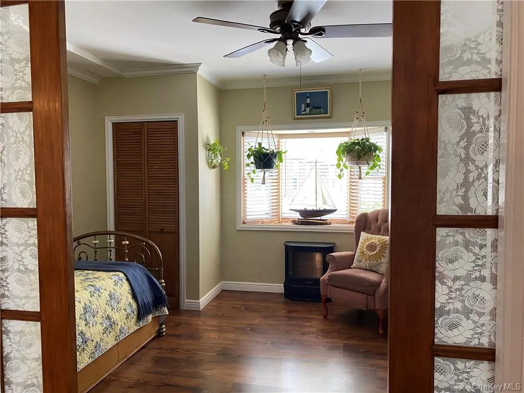 Bedroom with with wood floors Bedroom with with wood floors