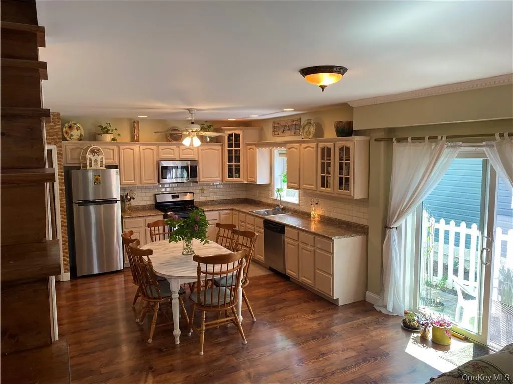 Eat in Kitchen with sliding glass doors to stone patio Eat in Kitchen with sliding glass doors to stone patio