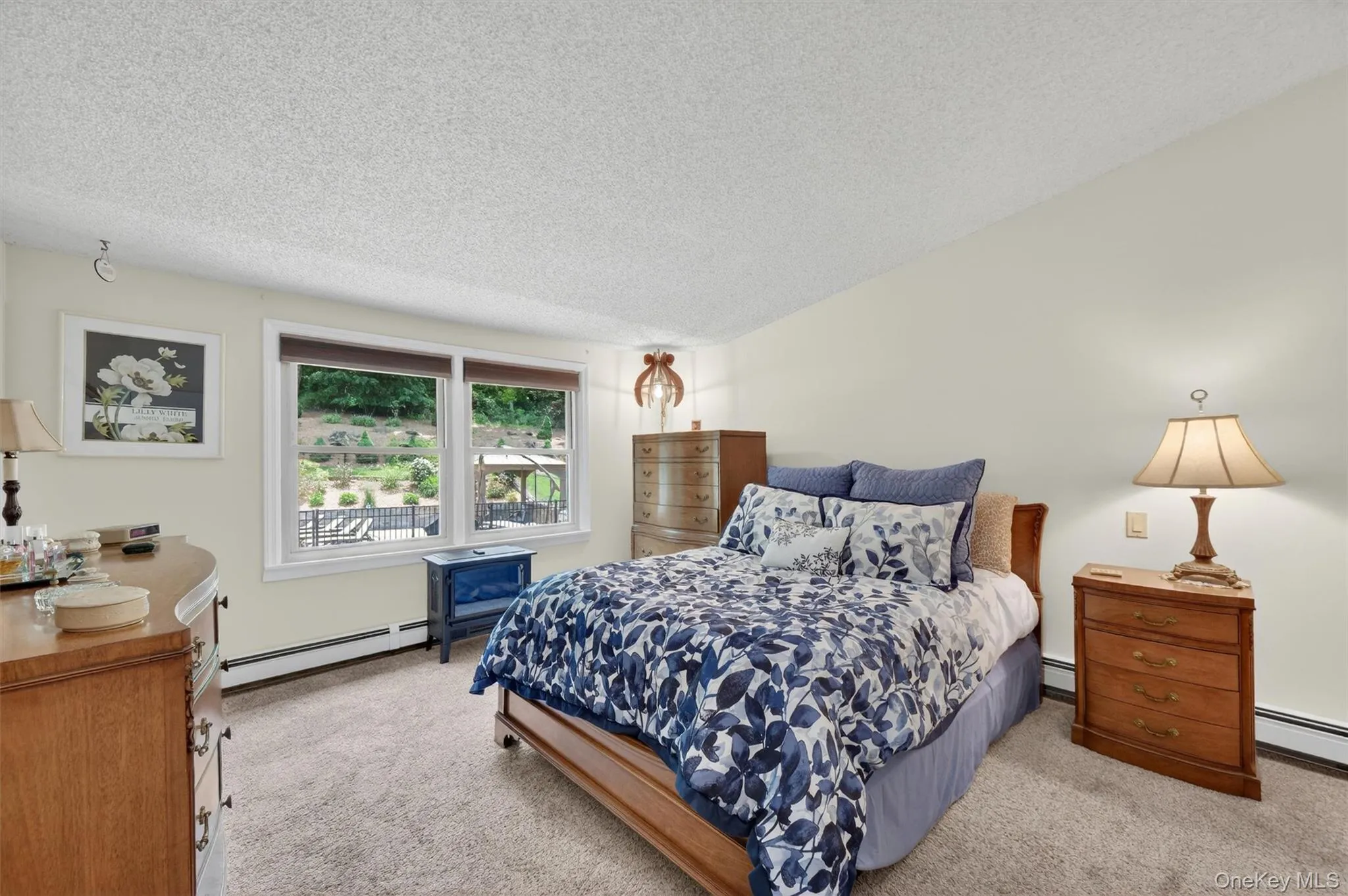 Generous bedroom in the second floor guest space. Generous bedroom in the second floor guest space.