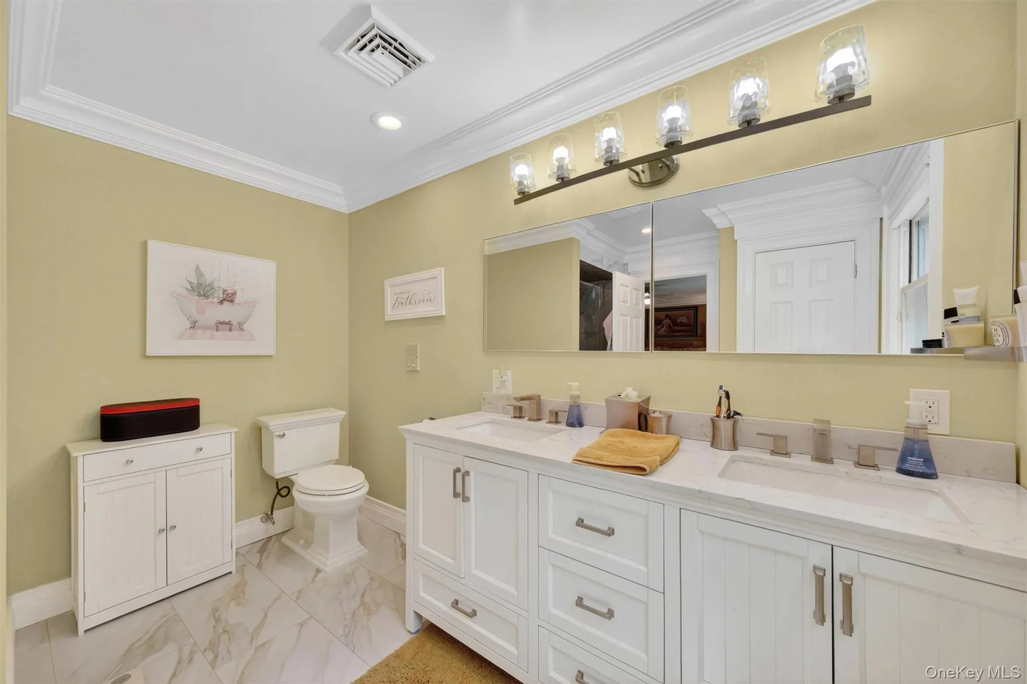 Primary full bath with double sinks. Primary full bath with double sinks.
