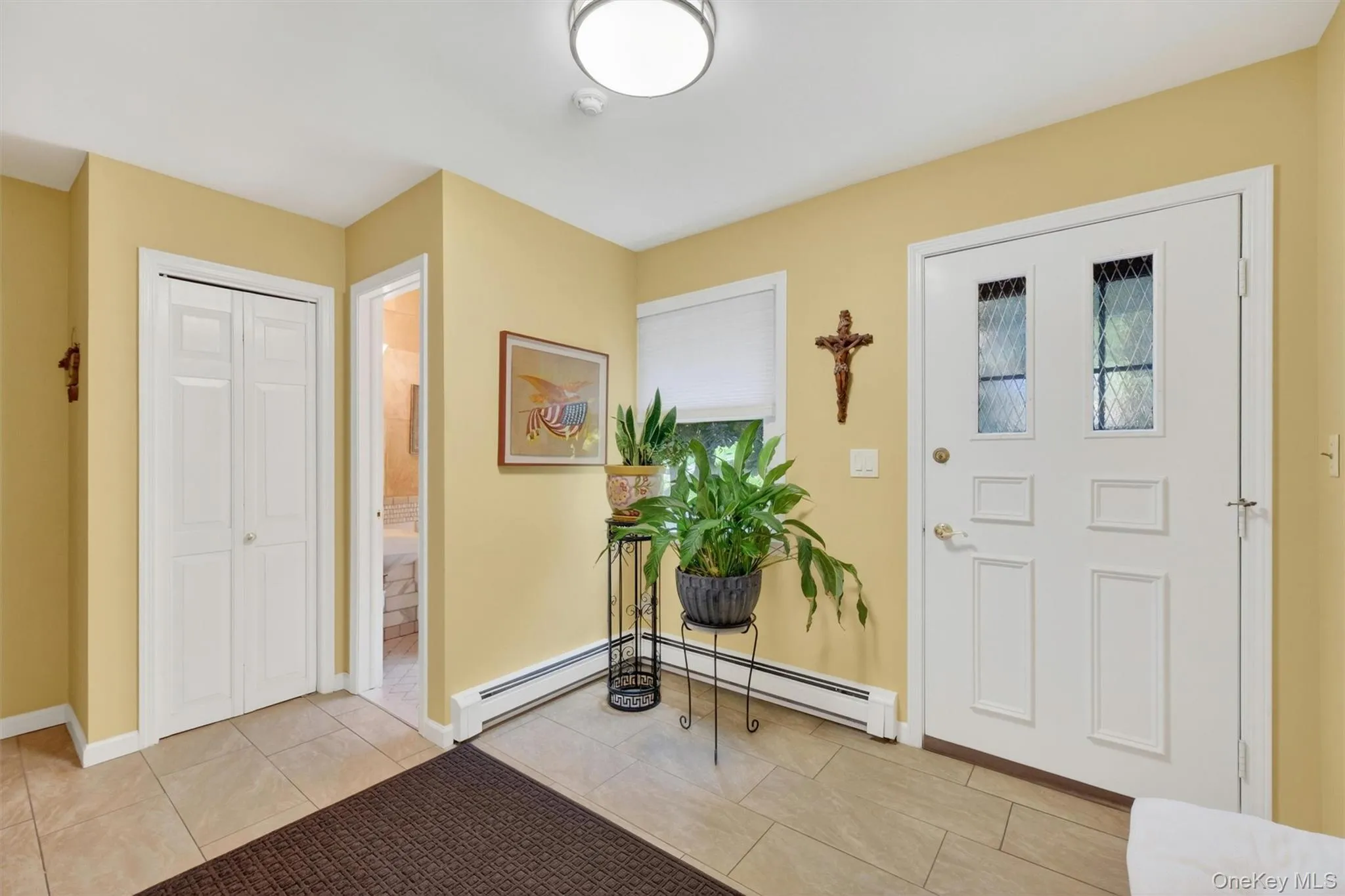 Mudroom off the kitchen with access to stairs that lead to upstairs guest space as well as down to the garage and exterior entrance. Mudroom off the kitchen with access to stairs that lead to upstairs guest space as well as down to the garage and exterior entrance.
