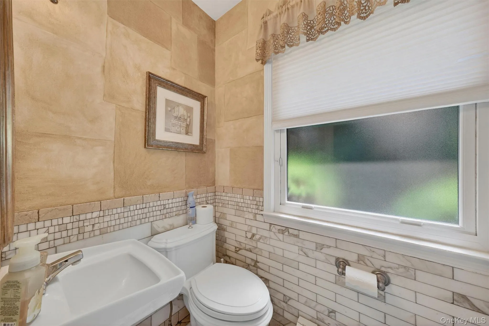 Half bath off the mudroom, convenient access for pool parties! Half bath off the mudroom, convenient access for pool parties!