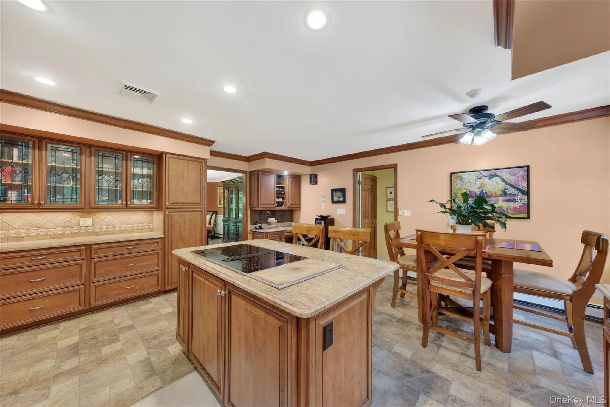 There's a great flow from the kitchen: dining room, den, mudroom (with half bath) that leads outside to the pool or upstairs to the finished guest space. There's a great flow from the kitchen: dining room, den, mudroom (with half bath) that leads outside to the pool or upstairs to the finished guest space.