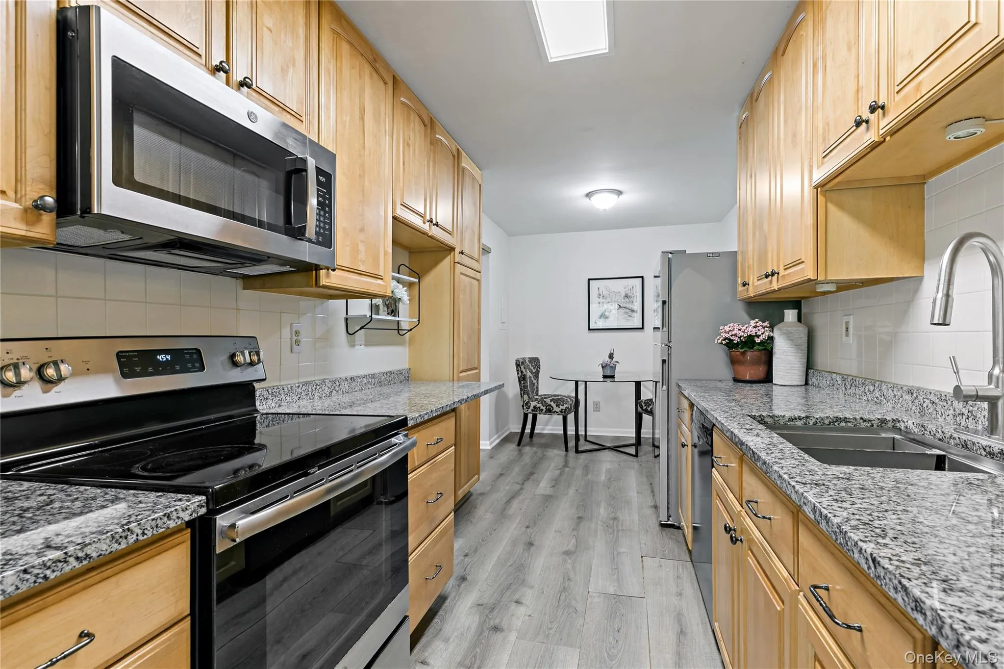 Modern eat-in kitchen with granite counters Modern eat-in kitchen with granite counters