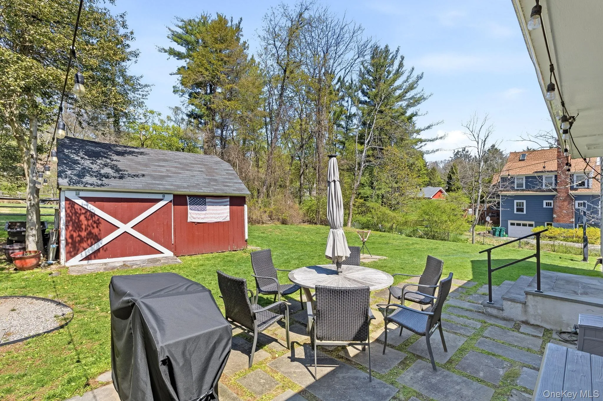 Back yard with a barn great for storage and potential multi-purpose uses. Back yard with a barn great for storage and potential multi-purpose uses.
