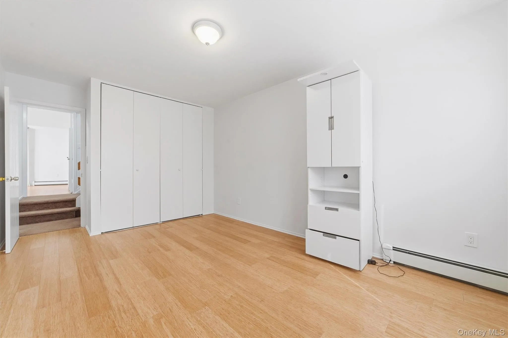 First Bedroom with windows and double wide closets First Bedroom with windows and double wide closets