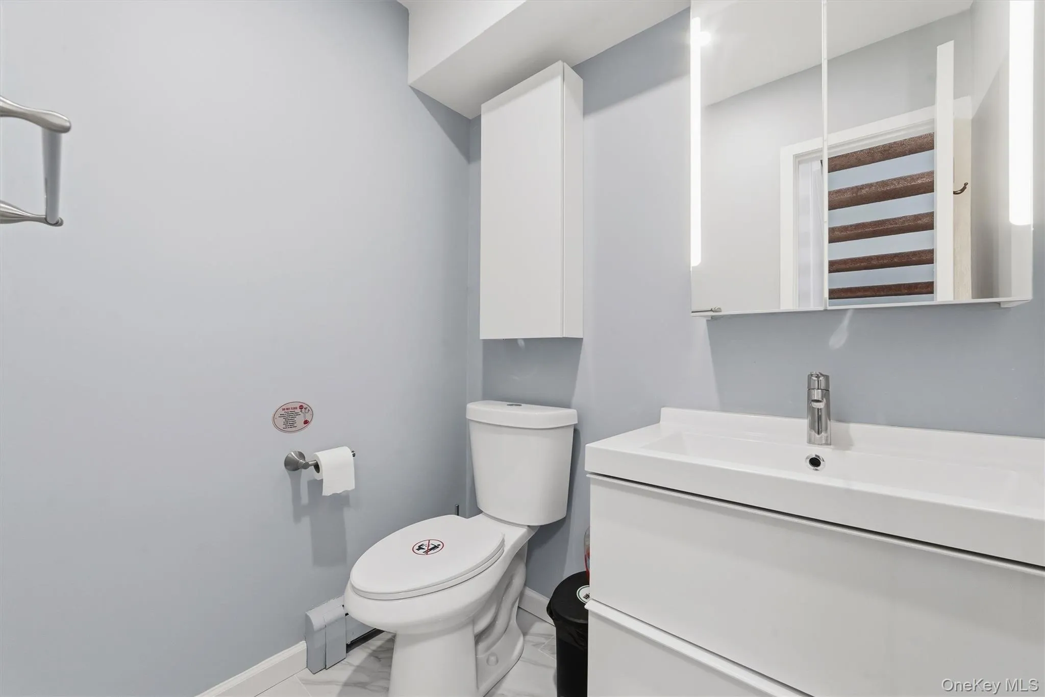 Located on the main floor is this completely updated 1/2 bath Located on the main floor is this completely updated 1/2 bath