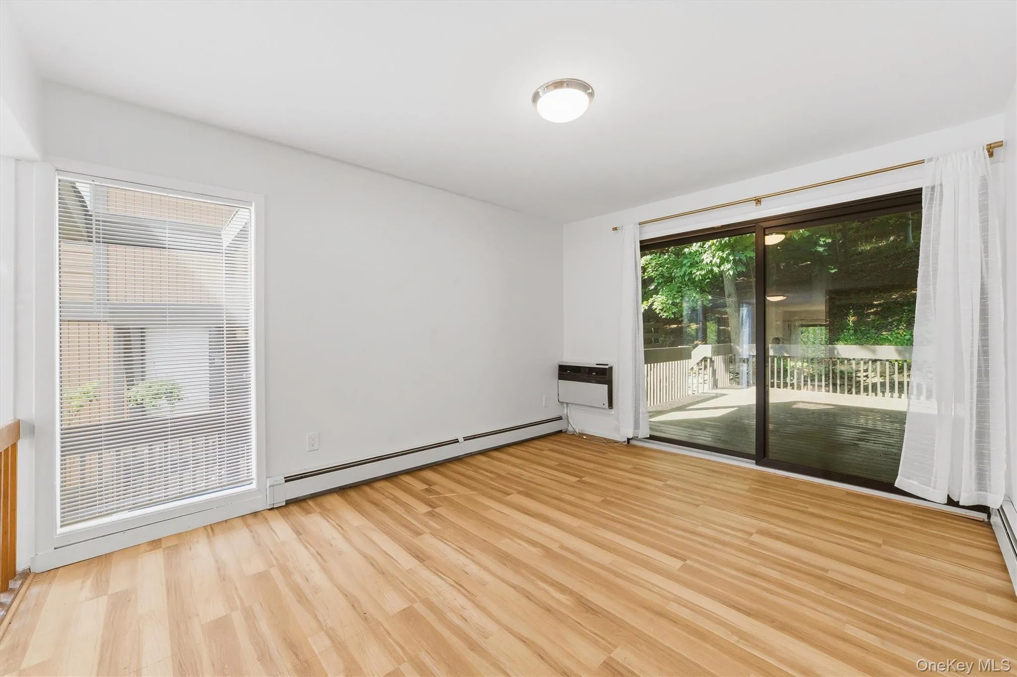 Dining room with sliding door access to an extra-large back porch area Dining room with sliding door access to an extra-large back porch area