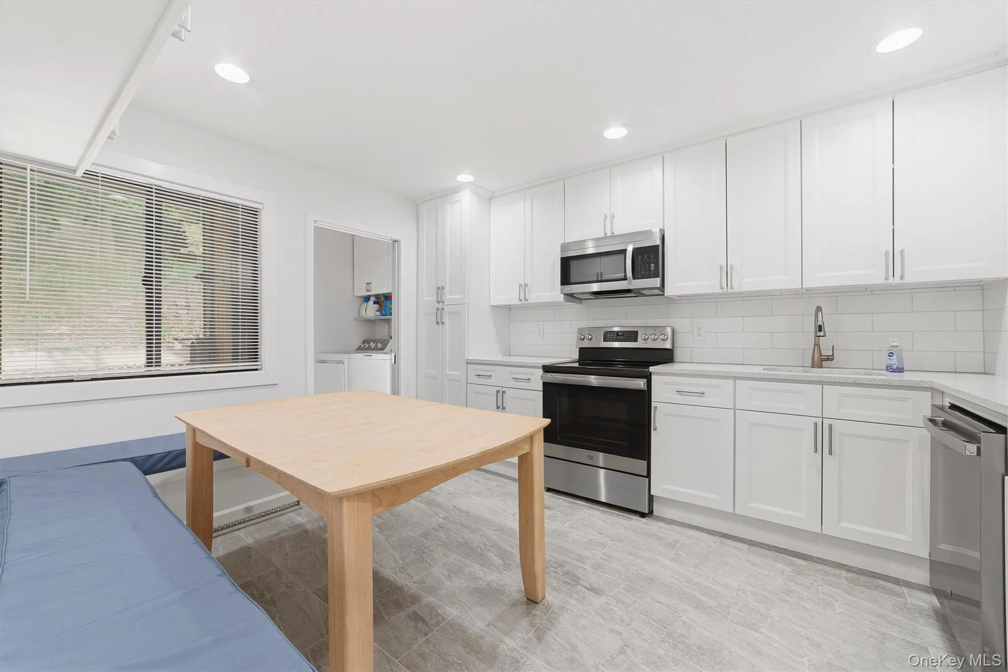 Fully renovated eat-in- kitchen. All-new stainless steel appliances, plus bench seating. Fully renovated eat-in- kitchen. All-new stainless steel appliances, plus bench seating.