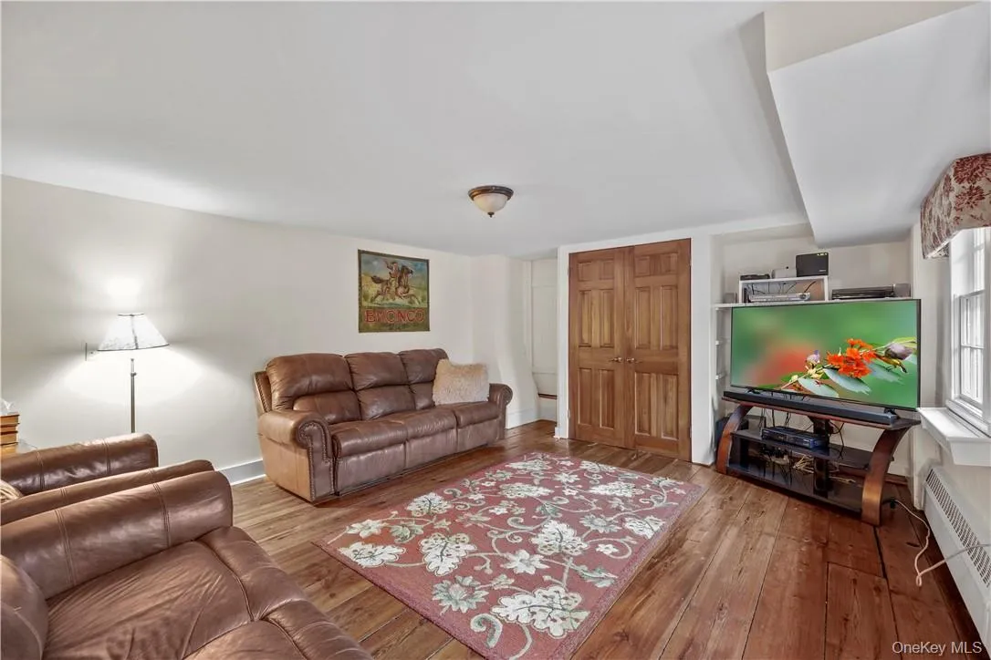 Main level family room has access to laundry & storage room. Main level family room has access to laundry & storage room.