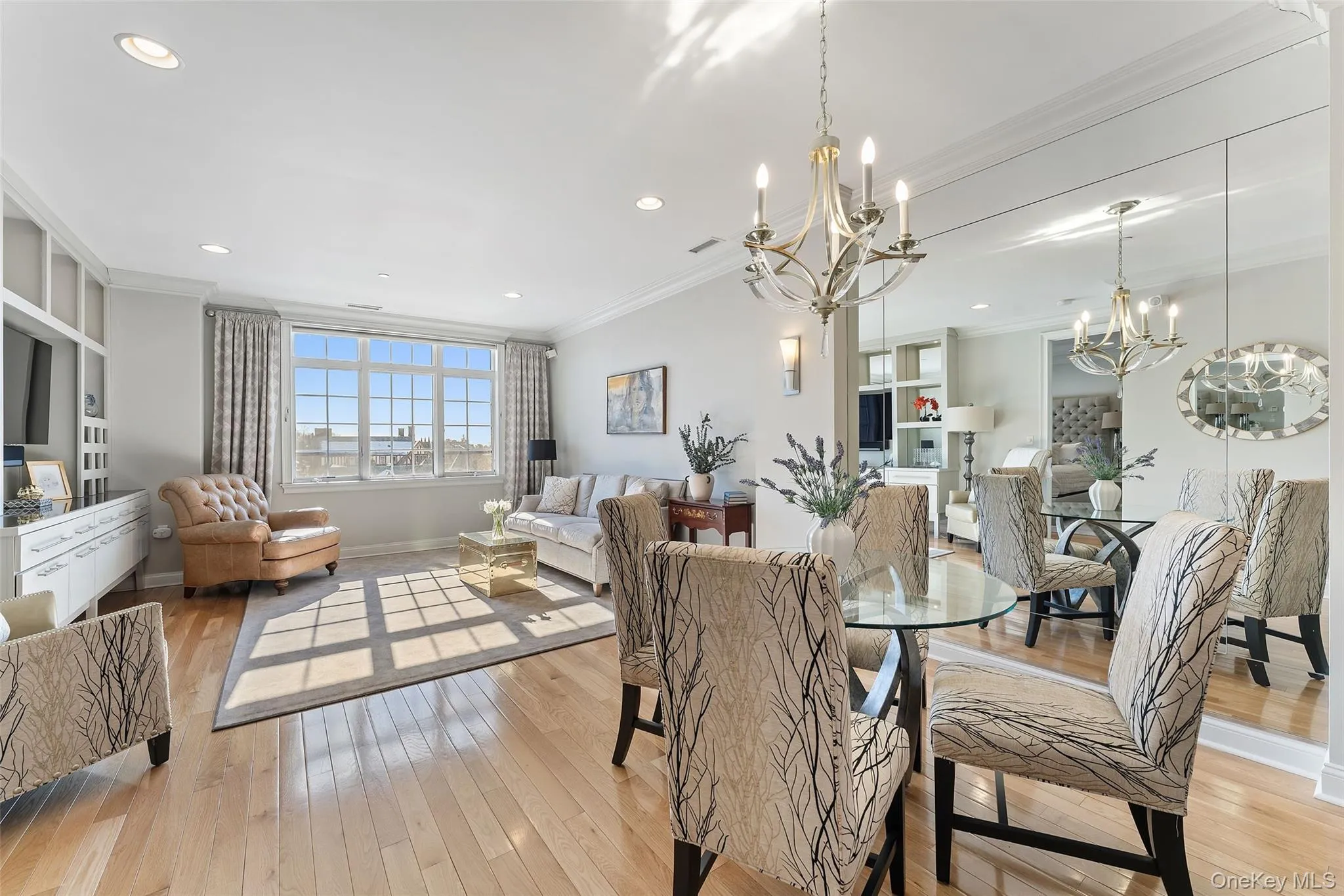 Hardwood floors and oversized windows create an inviting atmosphere. Hardwood floors and oversized windows create an inviting atmosphere.