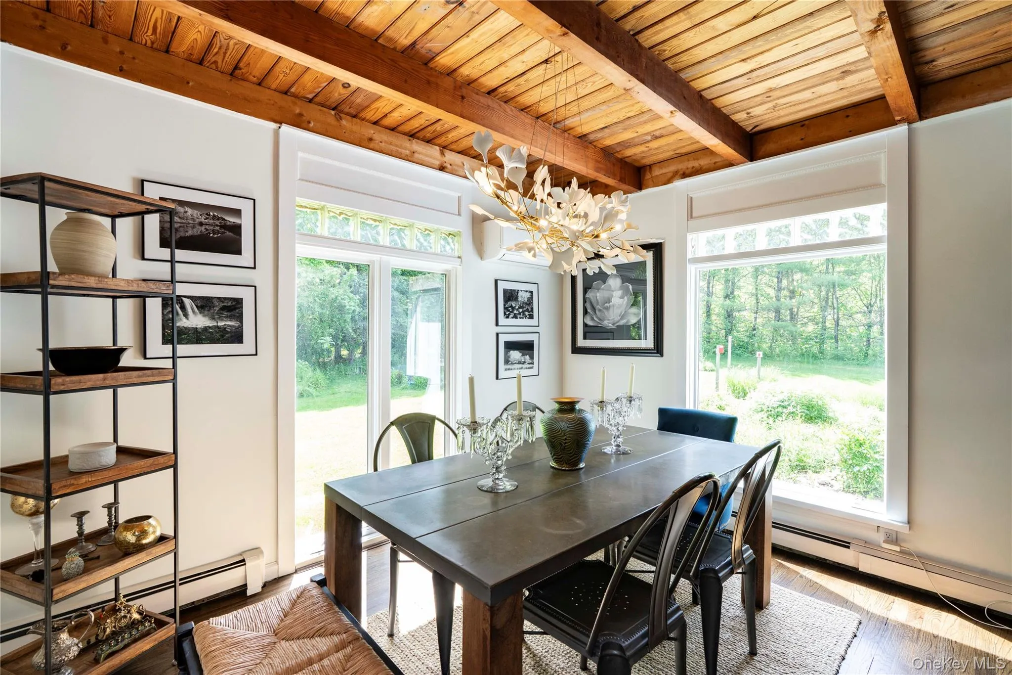 Dining Rm has a Large Picture Window and Glass Door to Deck Dining Rm has a Large Picture Window and Glass Door to Deck