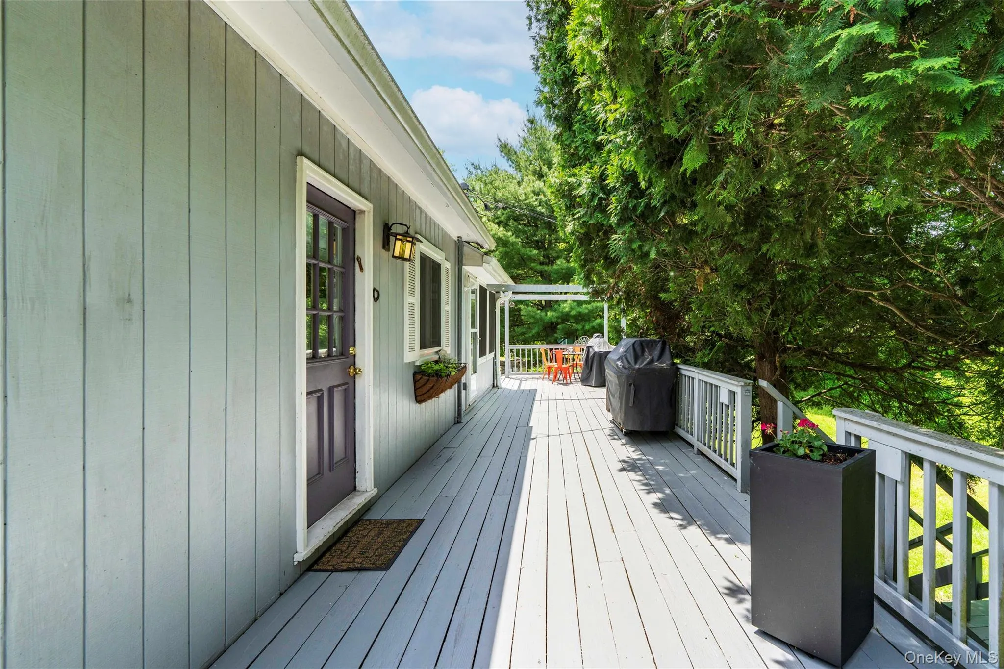 The Path from Driveway Leads to the Home Front Entrance from Deck The Path from Driveway Leads to the Home Front Entrance from Deck