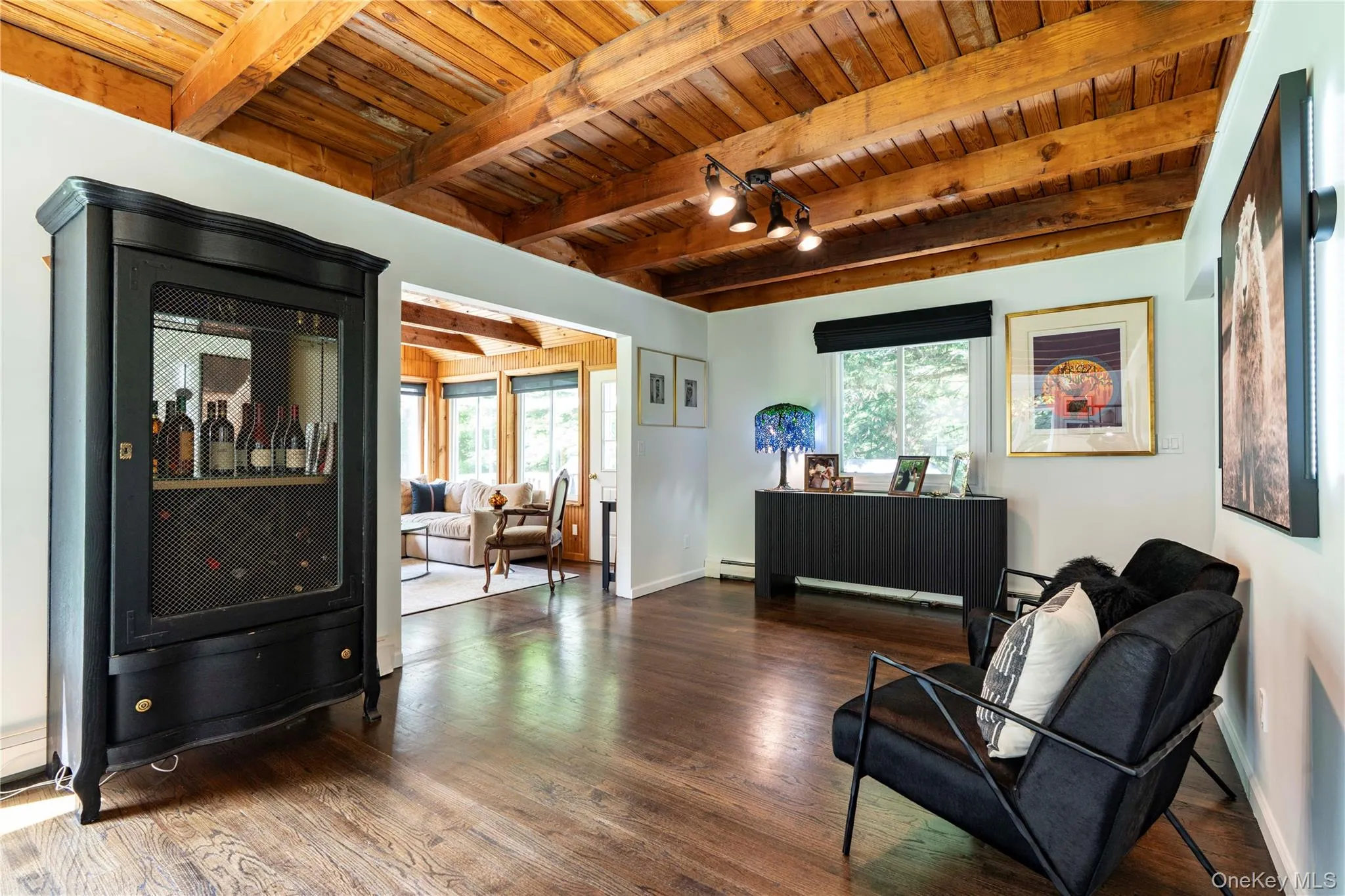 Family Room with Wood Beamed Ceilings and Oak Floors Family Room with Wood Beamed Ceilings and Oak Floors