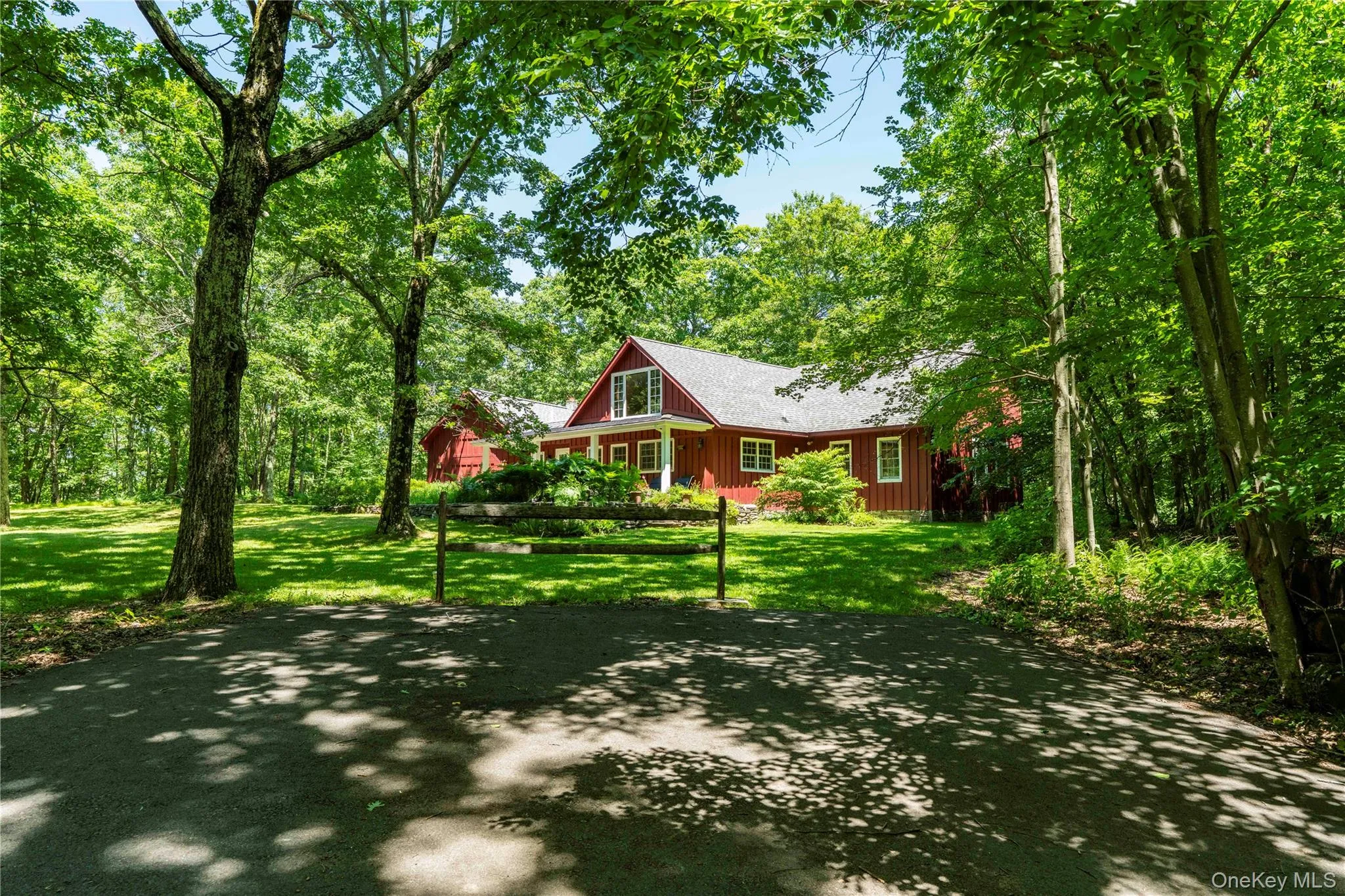 Meandering Paved Driveway Leads to Home Meandering Paved Driveway Leads to Home